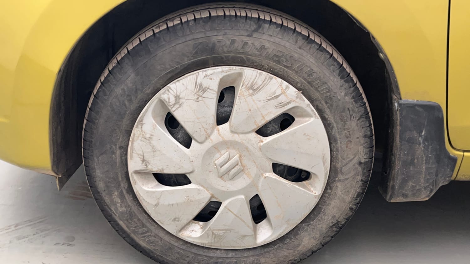 Used 2014 Maruti Suzuki Celerio VXi Petrol Manual tyres LEFT FRONT TYRE RIM VIEW