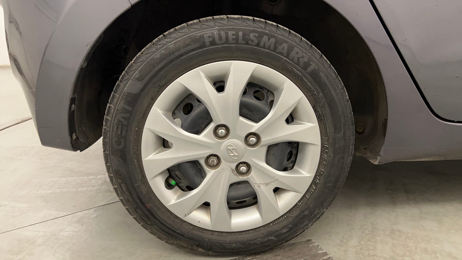 Used 2014 Hyundai Grand i10 Magna 1.2 Kappa VTVT Petrol Manual tyres RIGHT REAR TYRE RIM VIEW