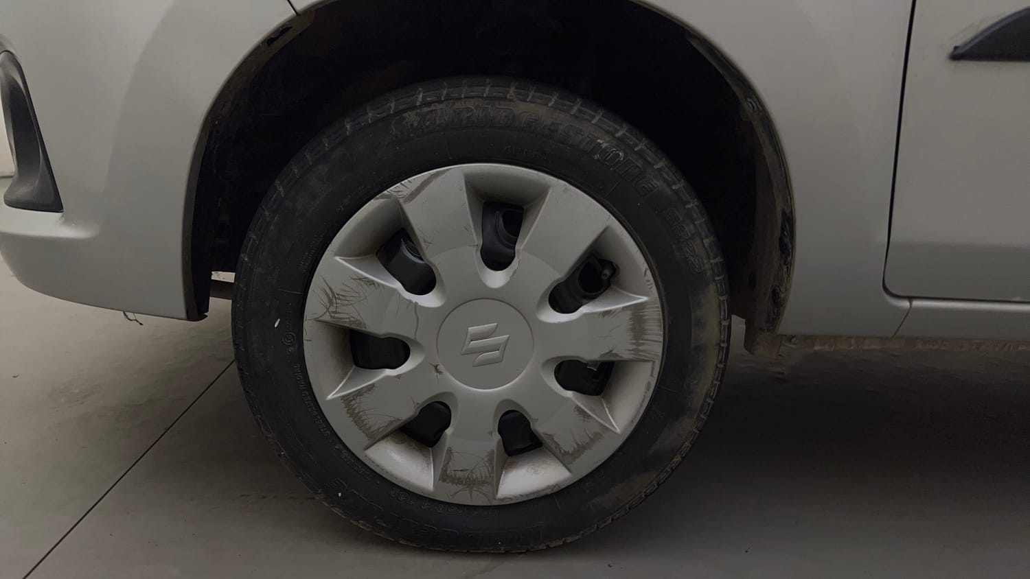 Used 2017 Maruti Suzuki Alto K10 VXi Petrol Manual tyres LEFT FRONT TYRE RIM VIEW