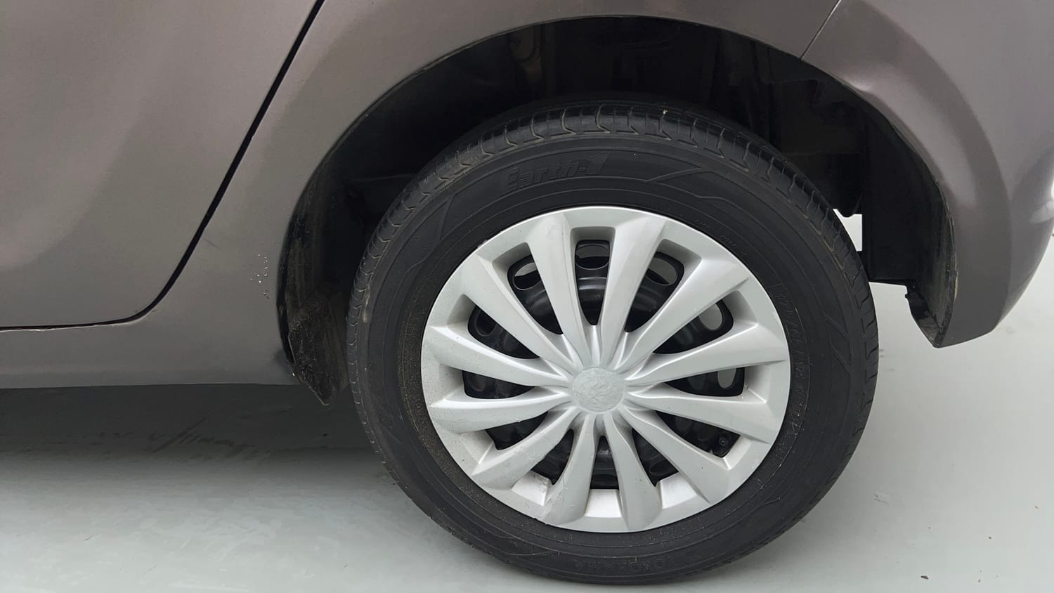 Used 2017 Tata Tiago Revotron XT Petrol Manual tyres LEFT REAR TYRE RIM VIEW