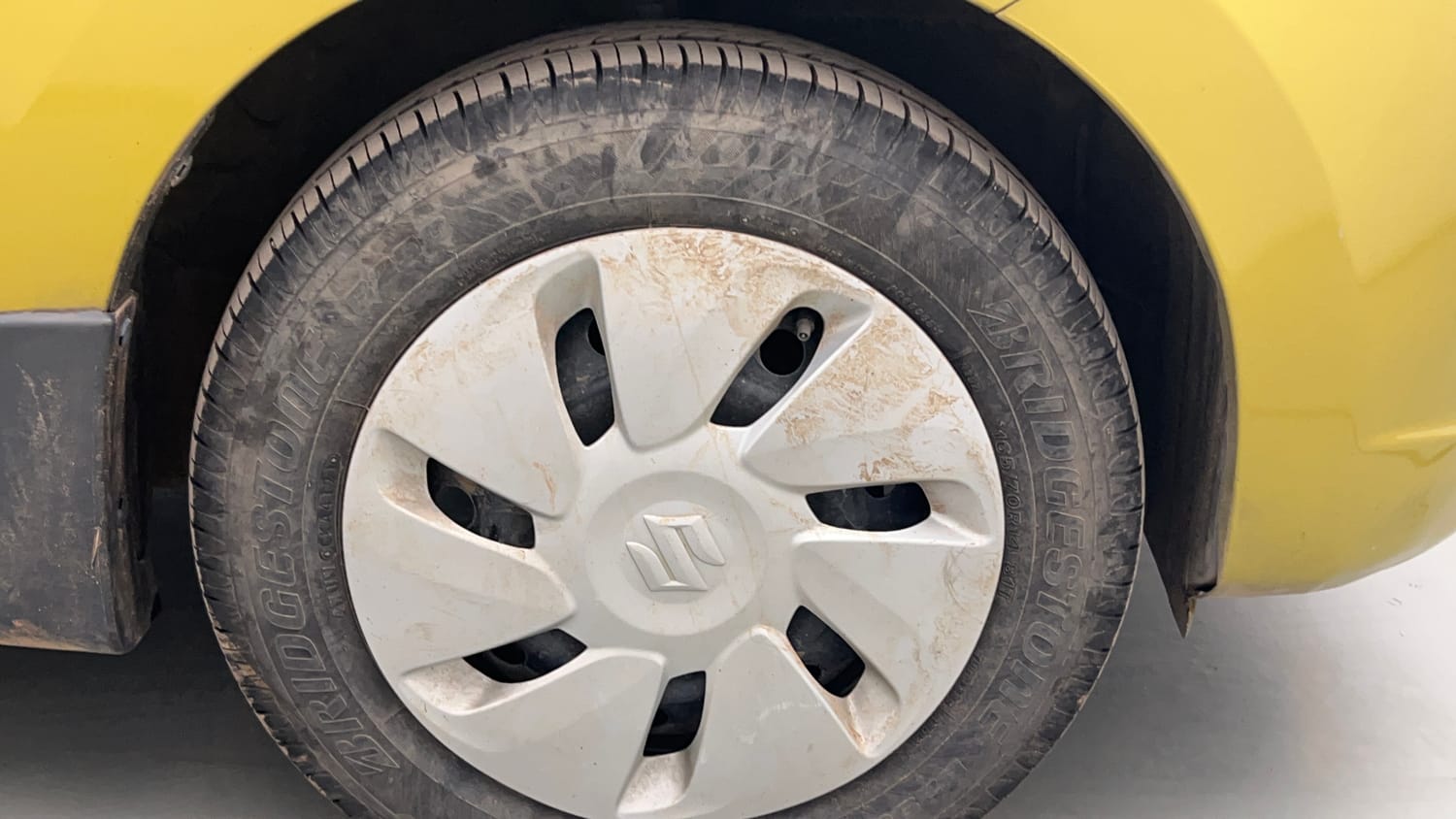 Used 2014 Maruti Suzuki Celerio VXi Petrol Manual tyres RIGHT FRONT TYRE RIM VIEW