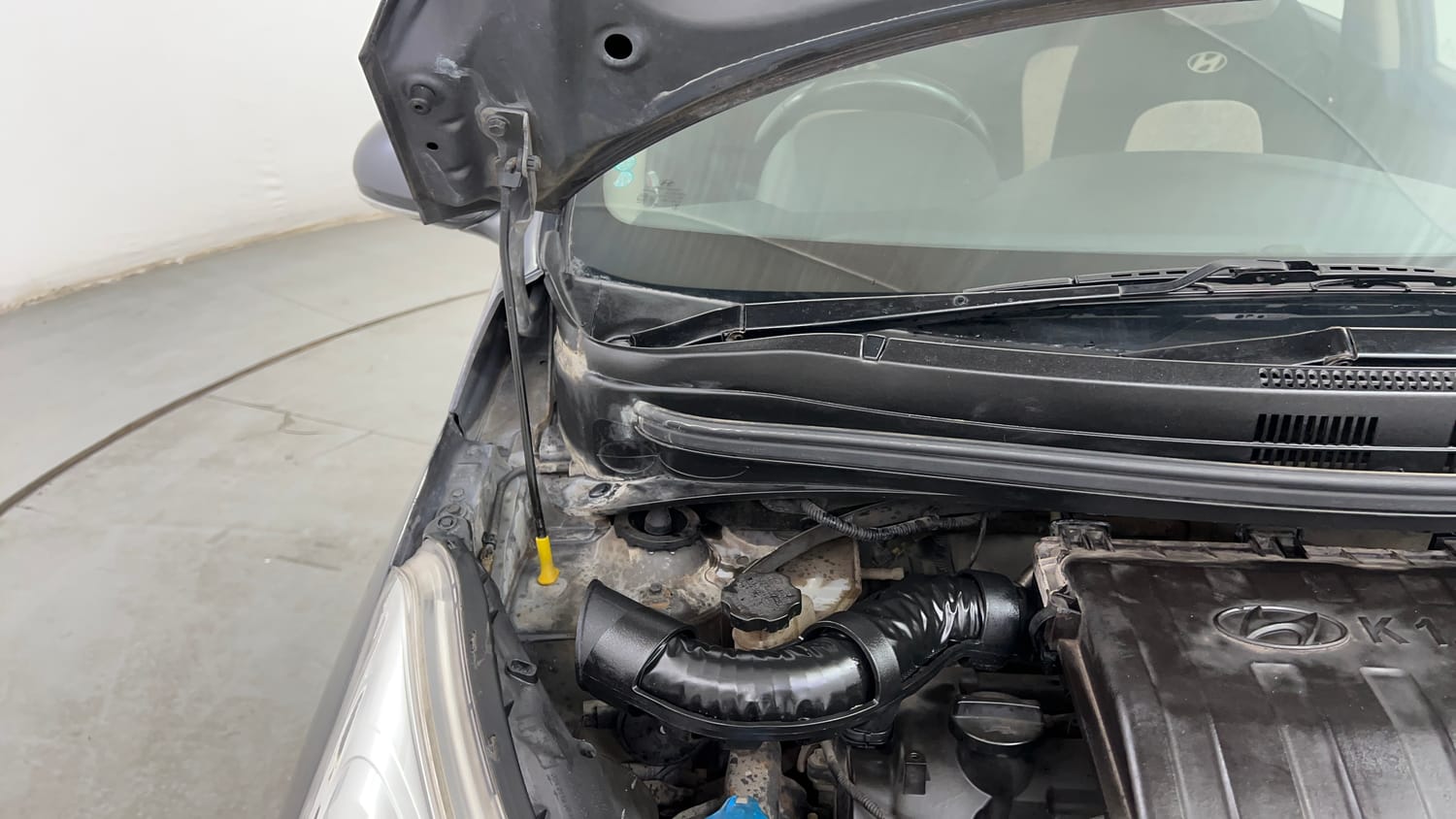 Used 2014 Hyundai Grand i10 Asta AT 1.2 Kappa VTVT Petrol Automatic engine ENGINE RIGHT SIDE HINGE & APRON VIEW