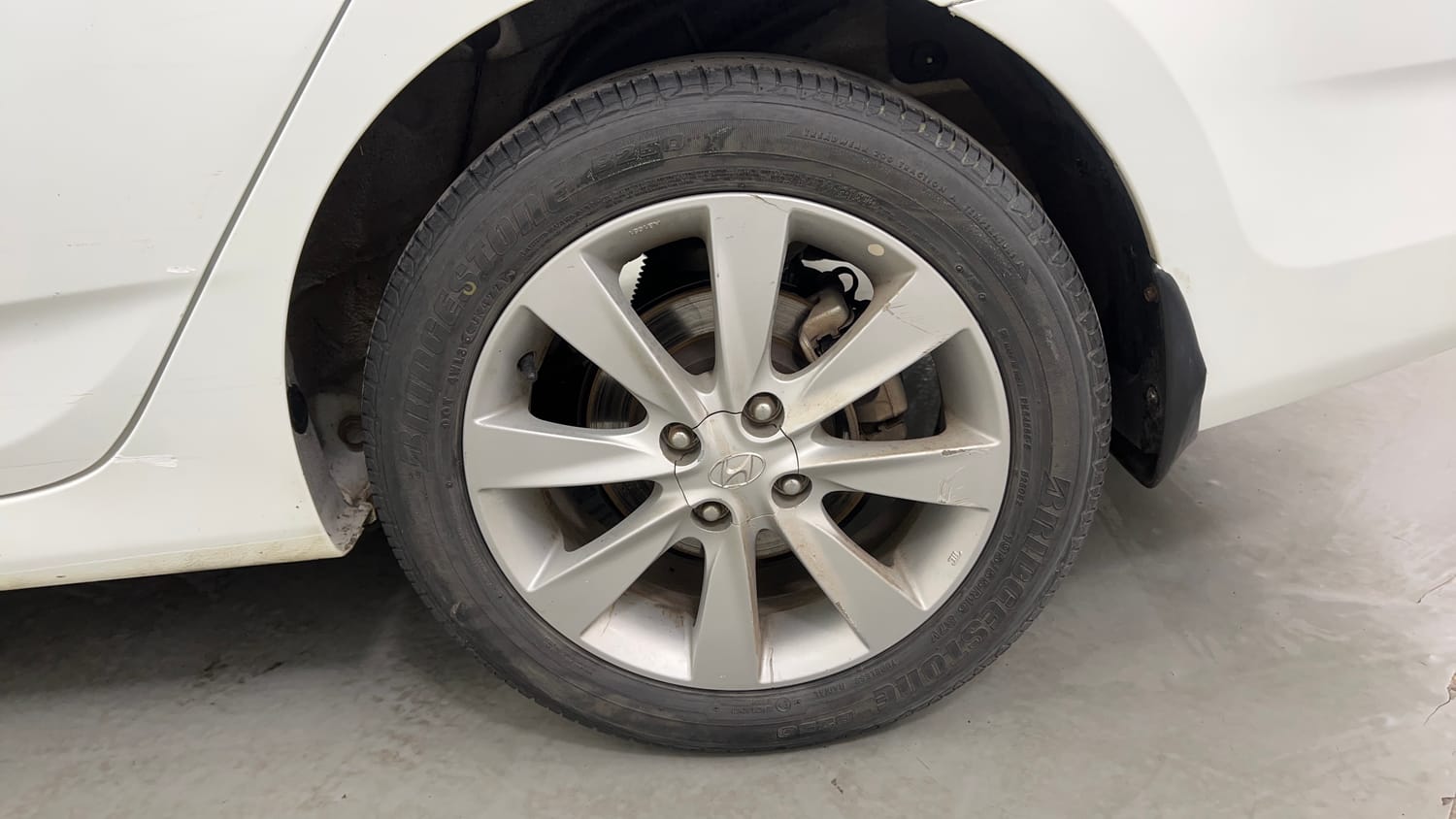 Used 2013 Hyundai Verna Fluidic 1.6 VTVT SX Opt Petrol Manual tyres LEFT REAR TYRE RIM VIEW