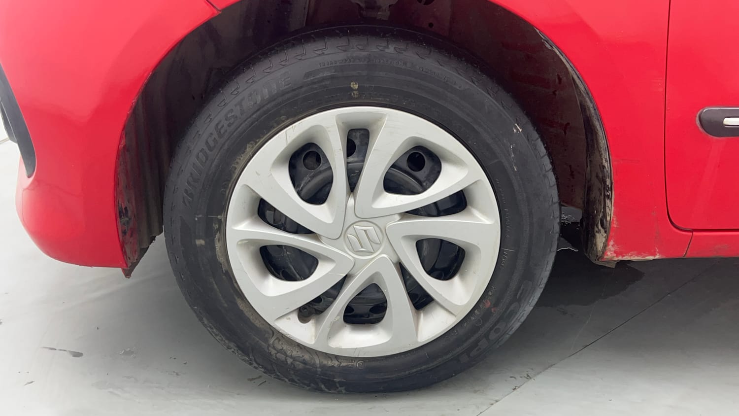 Used 2022 Maruti Suzuki Celerio VXi Petrol Manual tyres LEFT FRONT TYRE RIM VIEW