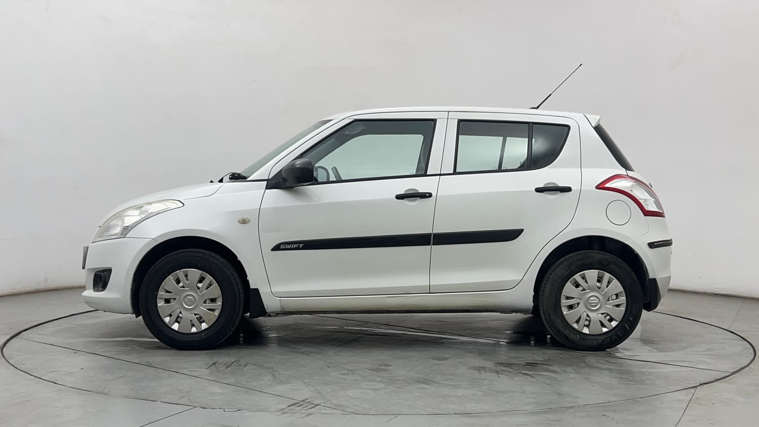 Used 2012 Maruti Suzuki Swift LXi Petrol Manual exterior LEFT SIDE VIEW
