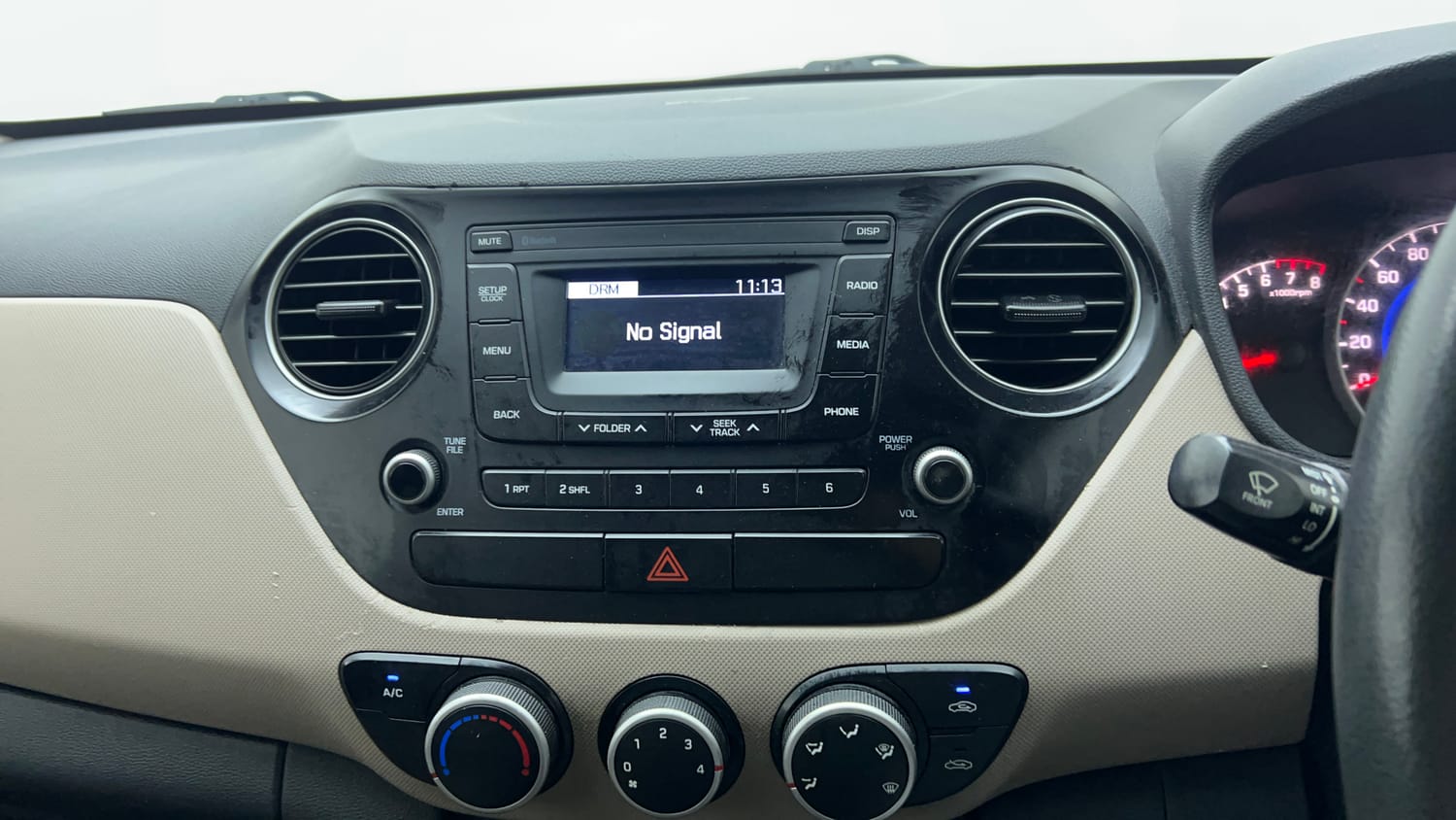 Used 2018 Hyundai Grand i10 Magna 1.2 Kappa VTVT Petrol Manual top_features Integrated (in-dash) music system