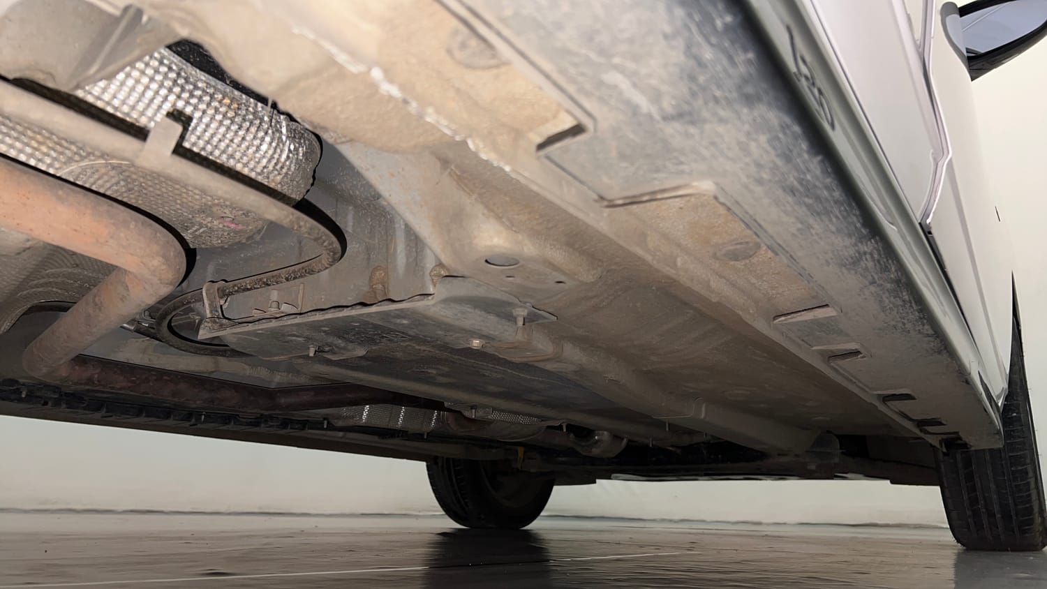 Used 2025 Hyundai New i20 Asta (O) 1.2 IVT Petrol Automatic extra REAR RIGHT UNDERBODY VIEW