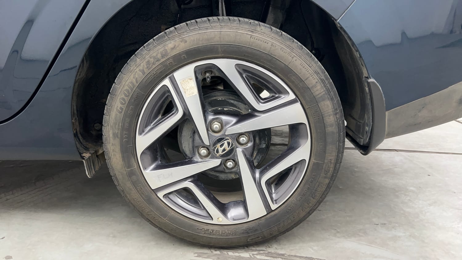 Used 2022 Hyundai Aura SX 1.2 Petrol Petrol Manual tyres LEFT REAR TYRE RIM VIEW