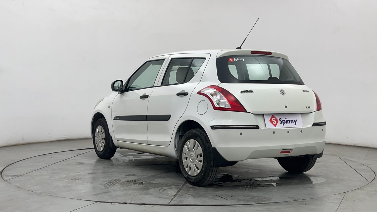 Used 2012 Maruti Suzuki Swift LXi Petrol Manual exterior LEFT REAR CORNER VIEW