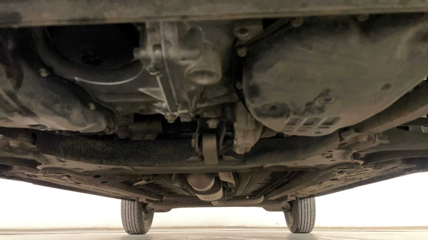 Used 2024 Renault Kiger RXZ Turbo CVT Dual Tone Petrol Automatic extra FRONT LEFT UNDERBODY VIEW