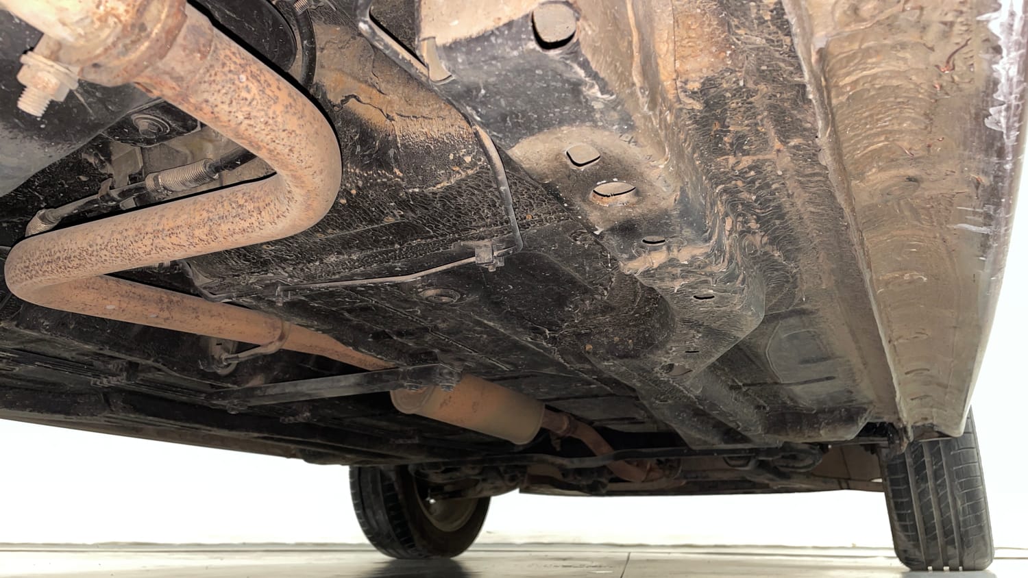 Used 2017 Tata Tigor Revotron XZ (O) Petrol Manual extra REAR RIGHT UNDERBODY VIEW