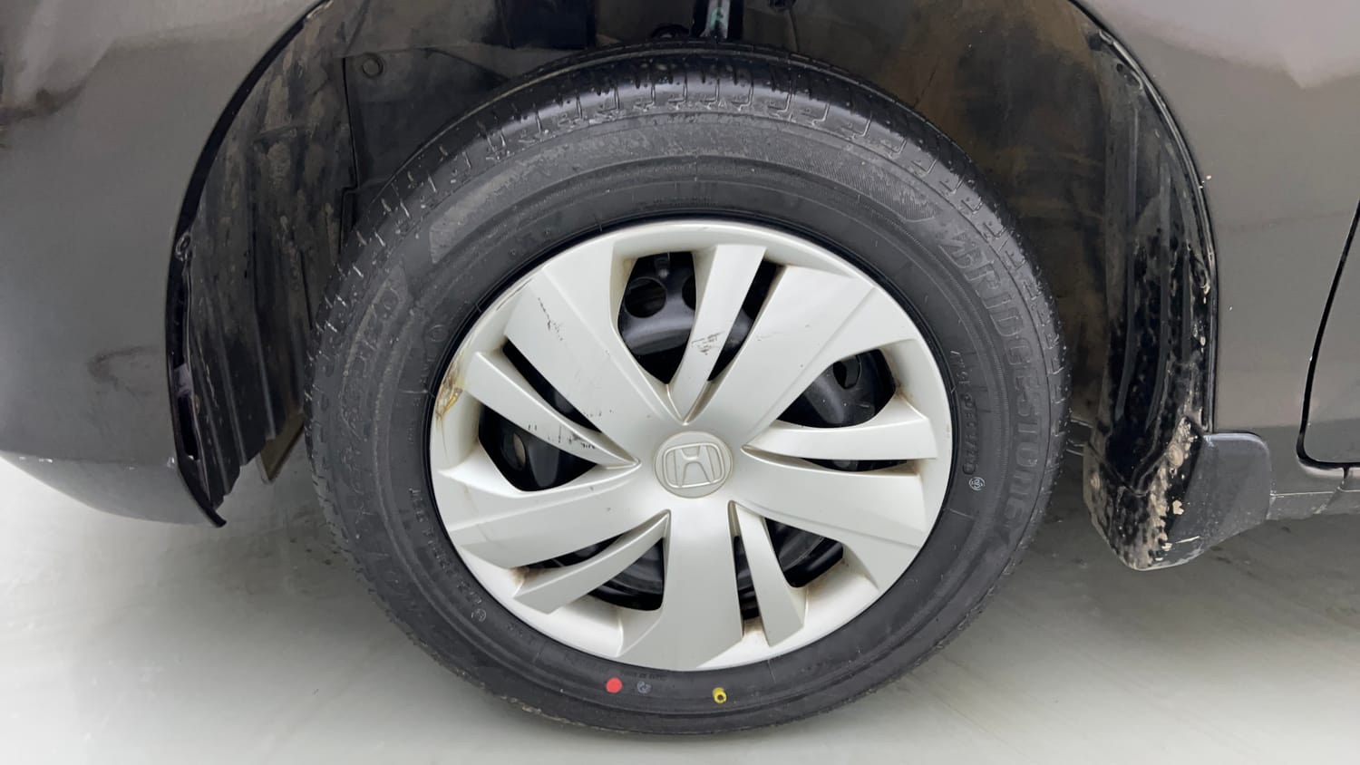 Used 2022 Honda Amaze S MT 1.2 Petrol Petrol Manual tyres LEFT FRONT TYRE RIM VIEW