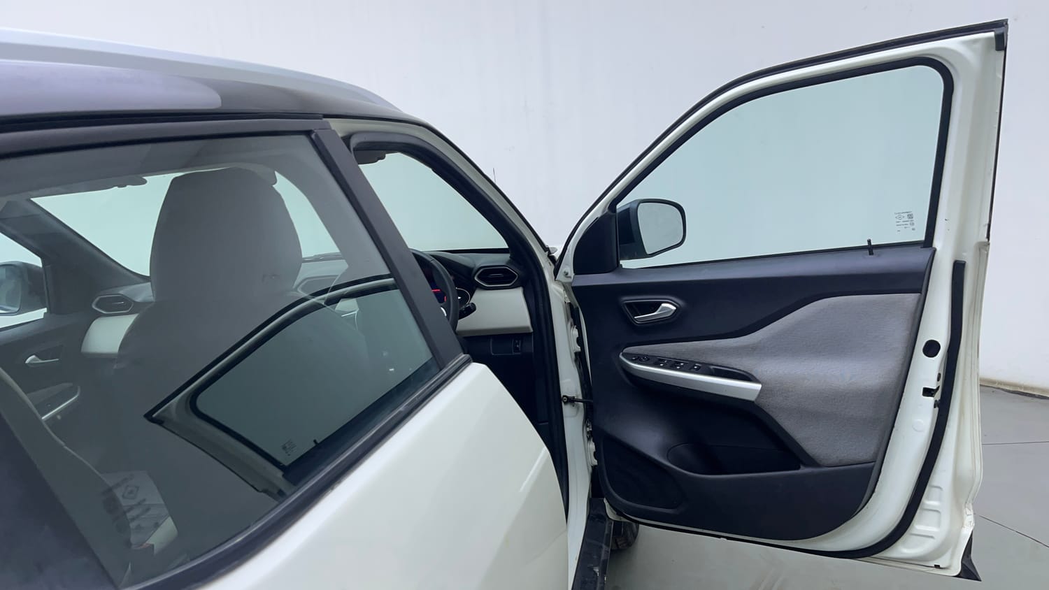 Used 2021 Nissan Magnite XV Dual Tone Petrol Manual interior RIGHT FRONT DOOR OPEN VIEW