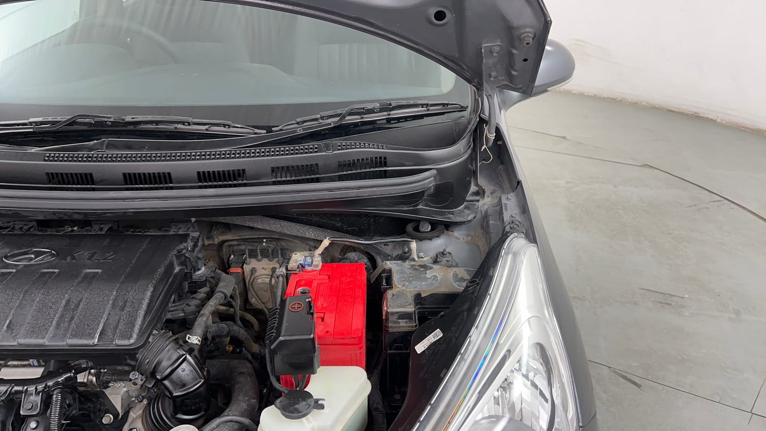 Used 2018 Hyundai Grand i10 Sportz 1.2 Kappa VTVT Petrol Manual engine ENGINE LEFT SIDE HINGE & APRON VIEW