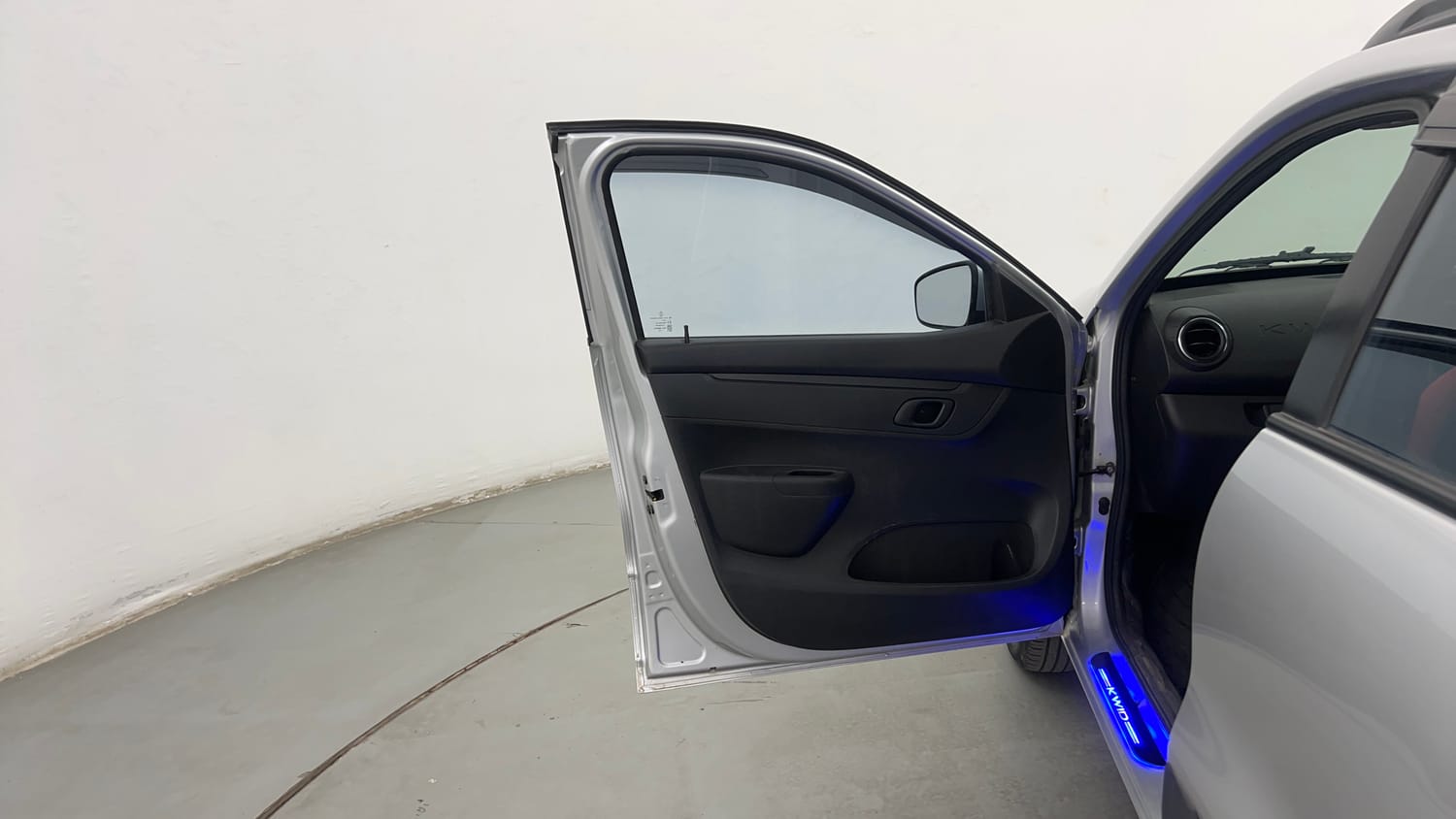 Used 2023 Renault Kwid RXT 1.0 Petrol Manual interior LEFT FRONT DOOR OPEN VIEW