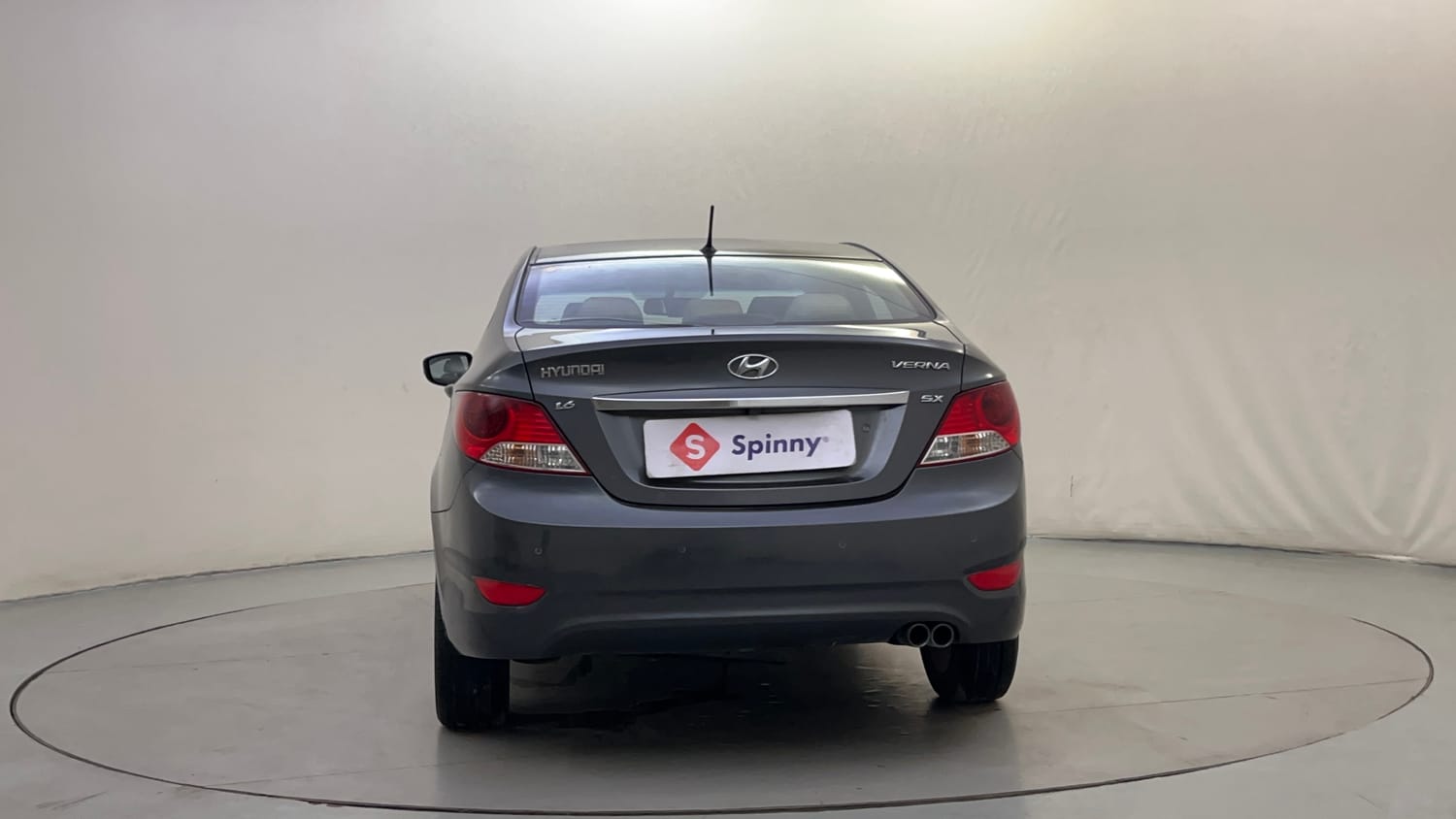 Used 2013 Hyundai Verna Fluidic 1.6 VTVT SX Petrol Manual exterior BACK VIEW
