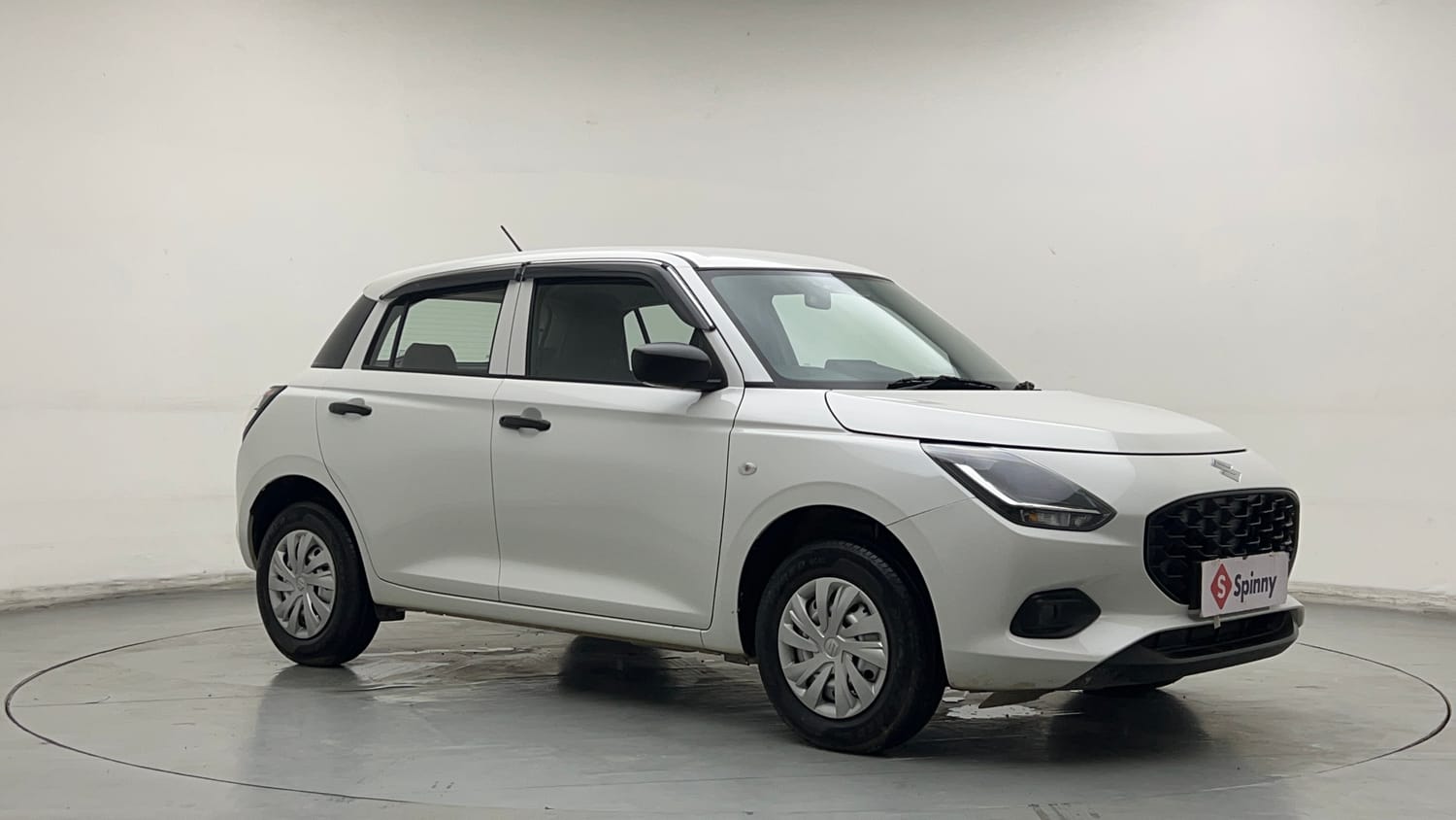 Used 2026 Maruti Suzuki Swift LXi Petrol Manual exterior RIGHT FRONT CORNER VIEW