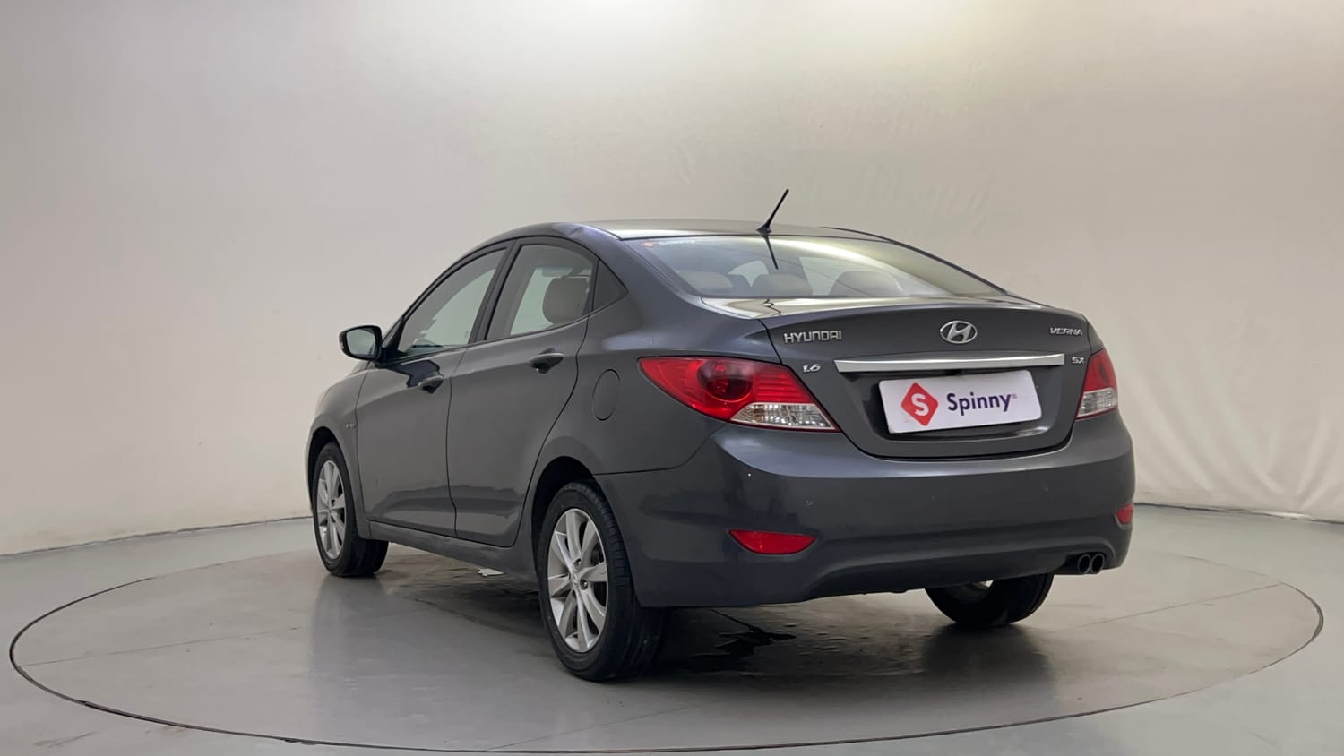 Used 2013 Hyundai Verna Fluidic 1.6 VTVT SX Petrol Manual exterior LEFT REAR CORNER VIEW