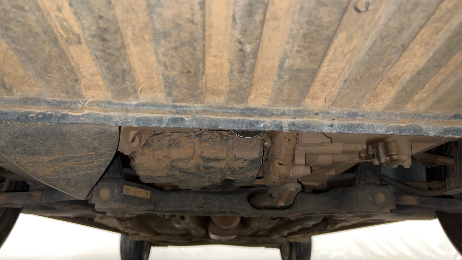 Used 2024 Volkswagen Virtus Comfortline 1.0 TSI MT Petrol Manual extra FRONT LEFT UNDERBODY VIEW