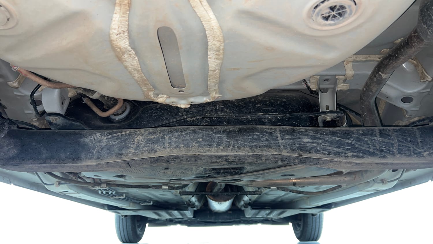 Used 2026 Maruti Suzuki Swift LXi Petrol Manual extra REAR UNDERBODY VIEW (TAKEN FROM REAR)