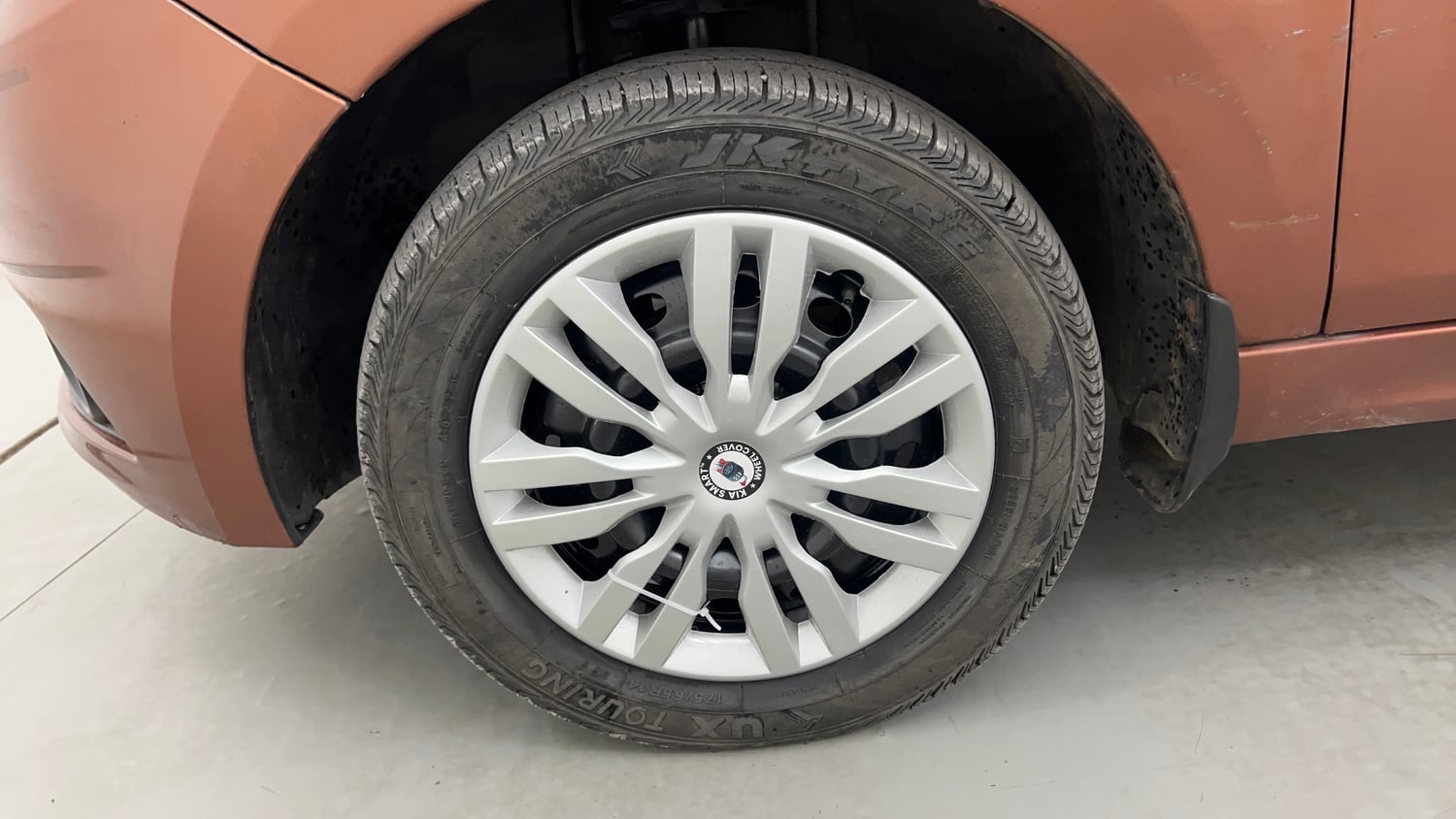 Used 2018 Tata Tigor Revotron XT Petrol + CNG (Outside Fitted) Cng Manual tyres LEFT FRONT TYRE RIM VIEW