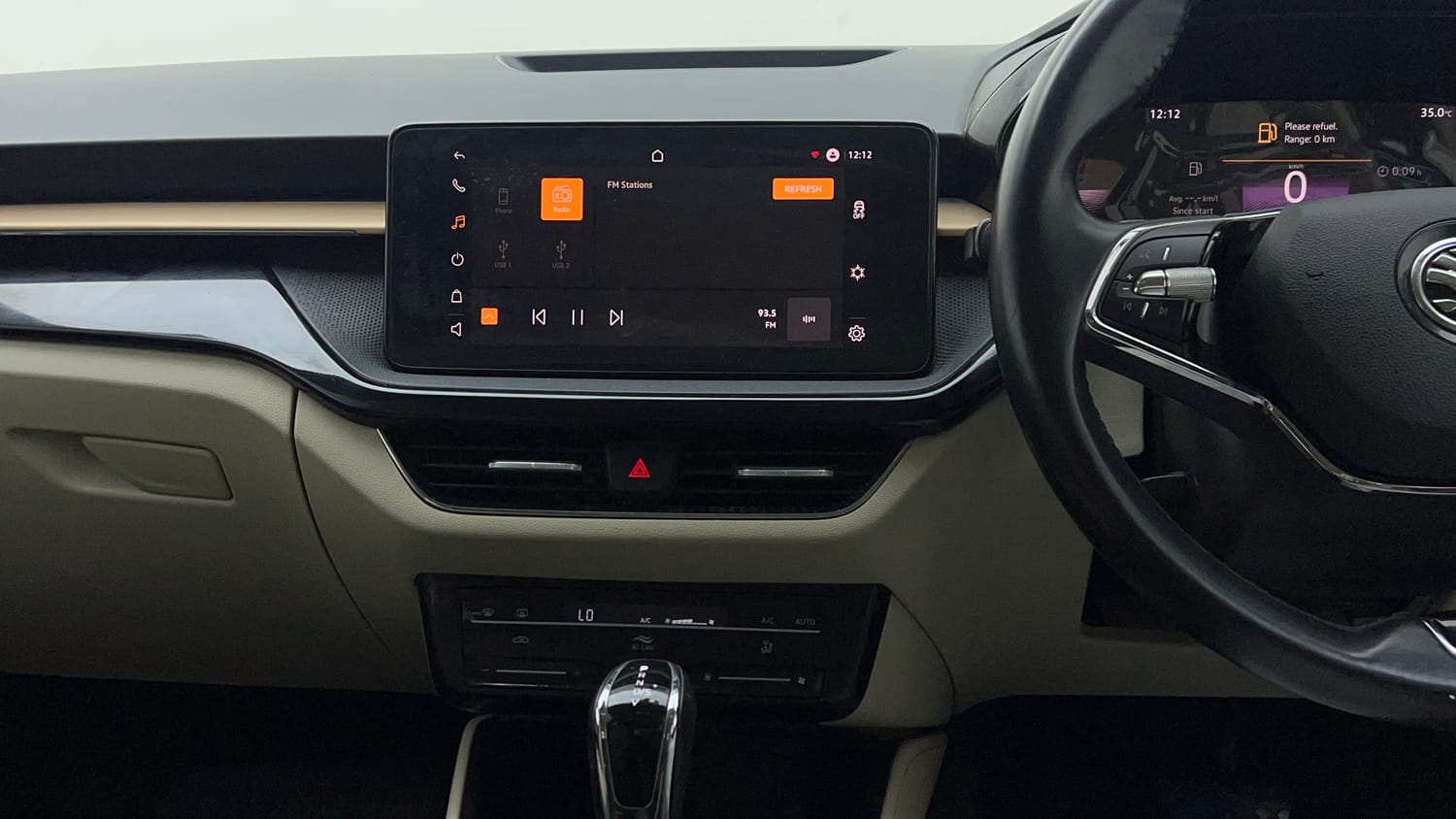 Used 2022 Skoda Slavia Style 1.0L TSI AT Petrol Automatic interior MUSIC SYSTEM & AC CONTROL VIEW