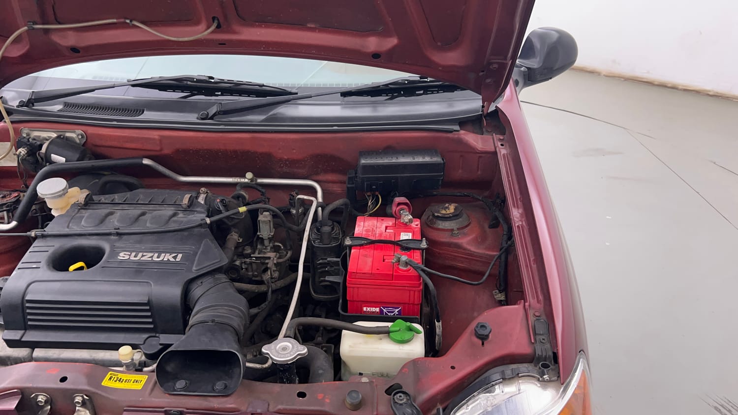 Used 2014 Maruti Suzuki Alto K10 VXi Petrol Manual engine ENGINE LEFT SIDE HINGE & APRON VIEW