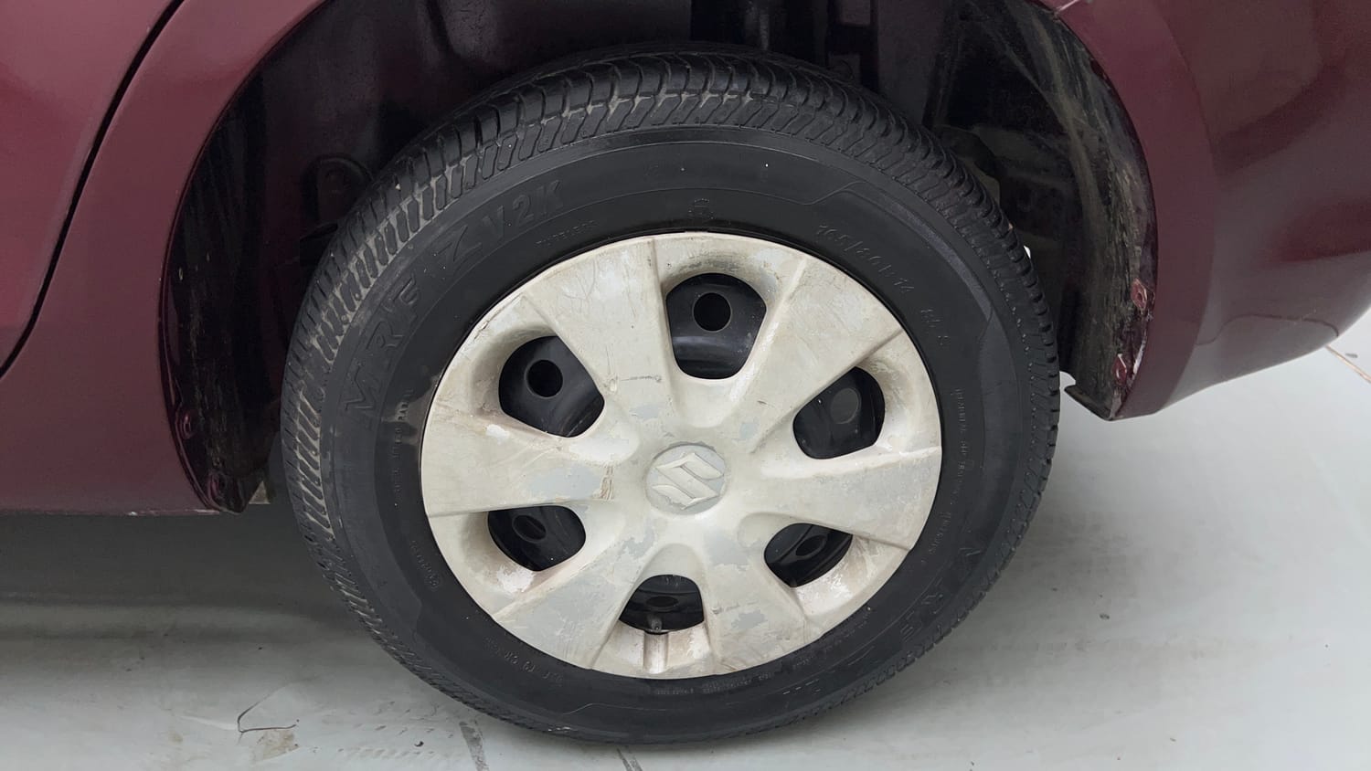 Used 2015 Maruti Suzuki Swift Dzire VXI Petrol Manual tyres LEFT REAR TYRE RIM VIEW