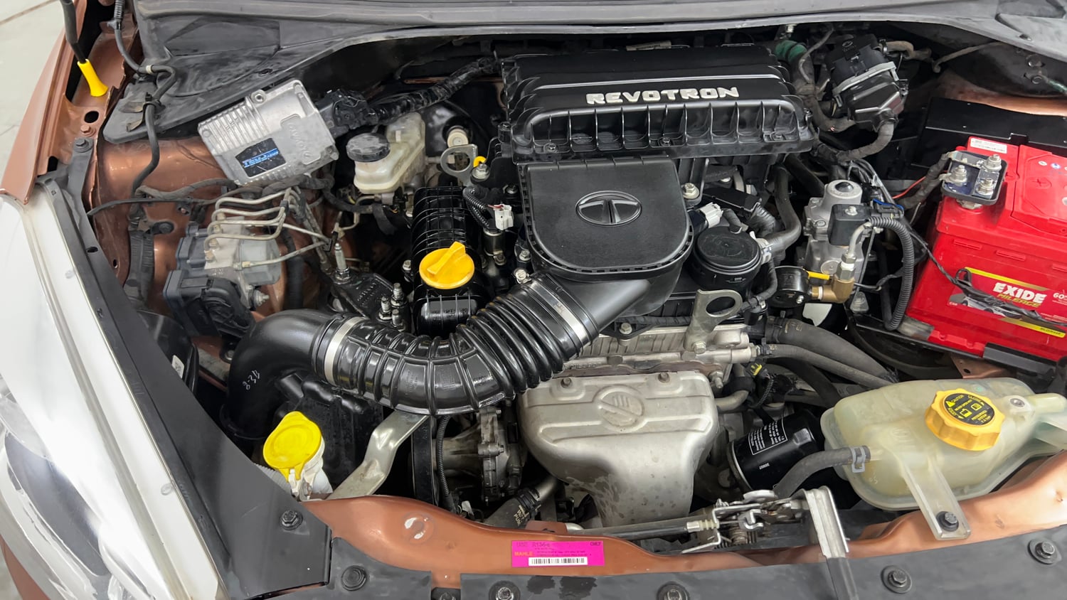 Used 2018 Tata Tigor Revotron XT Petrol + CNG (Outside Fitted) Cng Manual engine ENGINE RIGHT SIDE VIEW