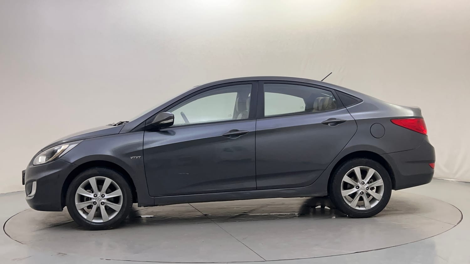 Used 2013 Hyundai Verna Fluidic 1.6 VTVT SX Petrol Manual exterior LEFT SIDE VIEW