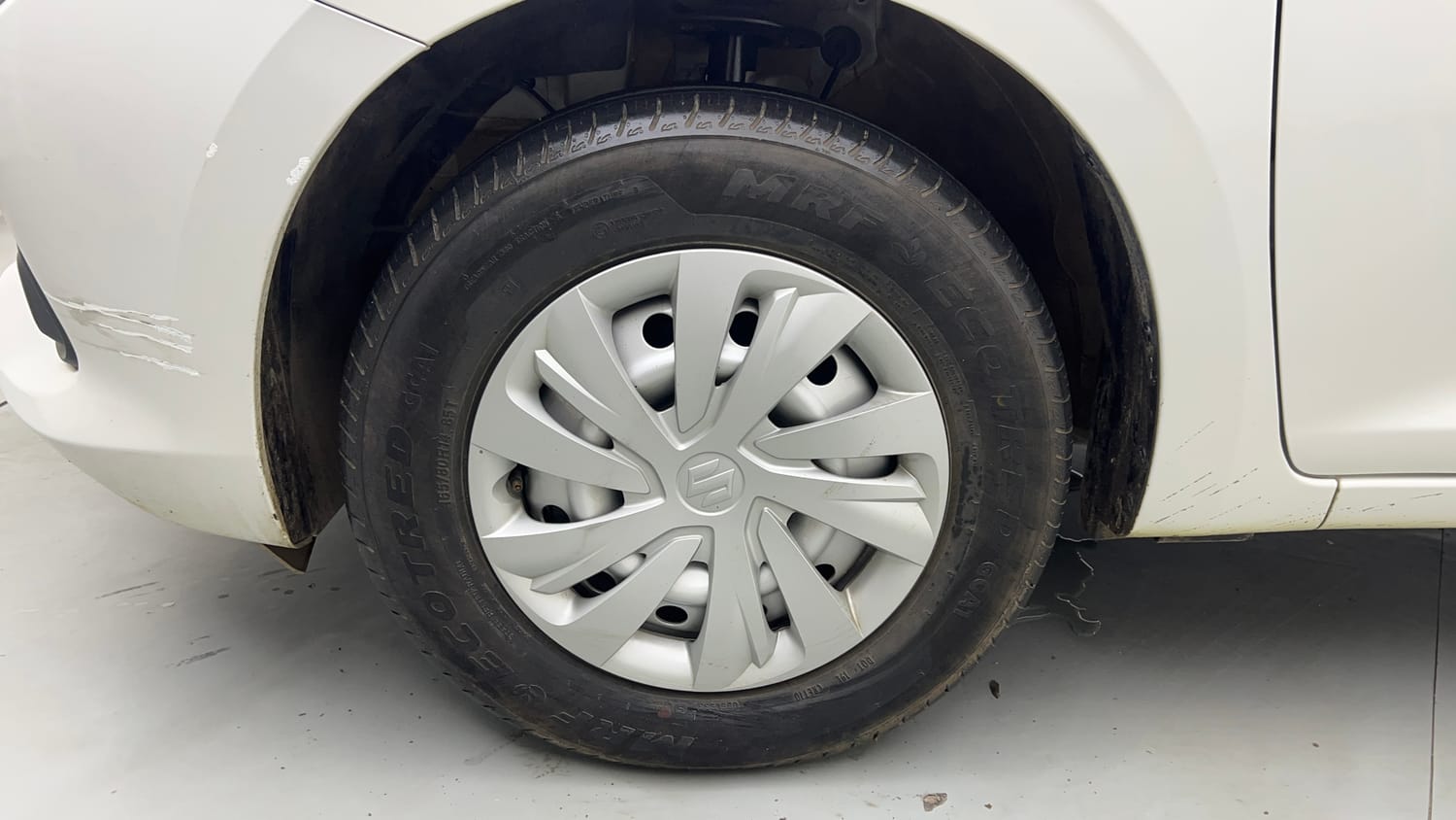 Used 2026 Maruti Suzuki Swift LXi Petrol Manual tyres LEFT FRONT TYRE RIM VIEW