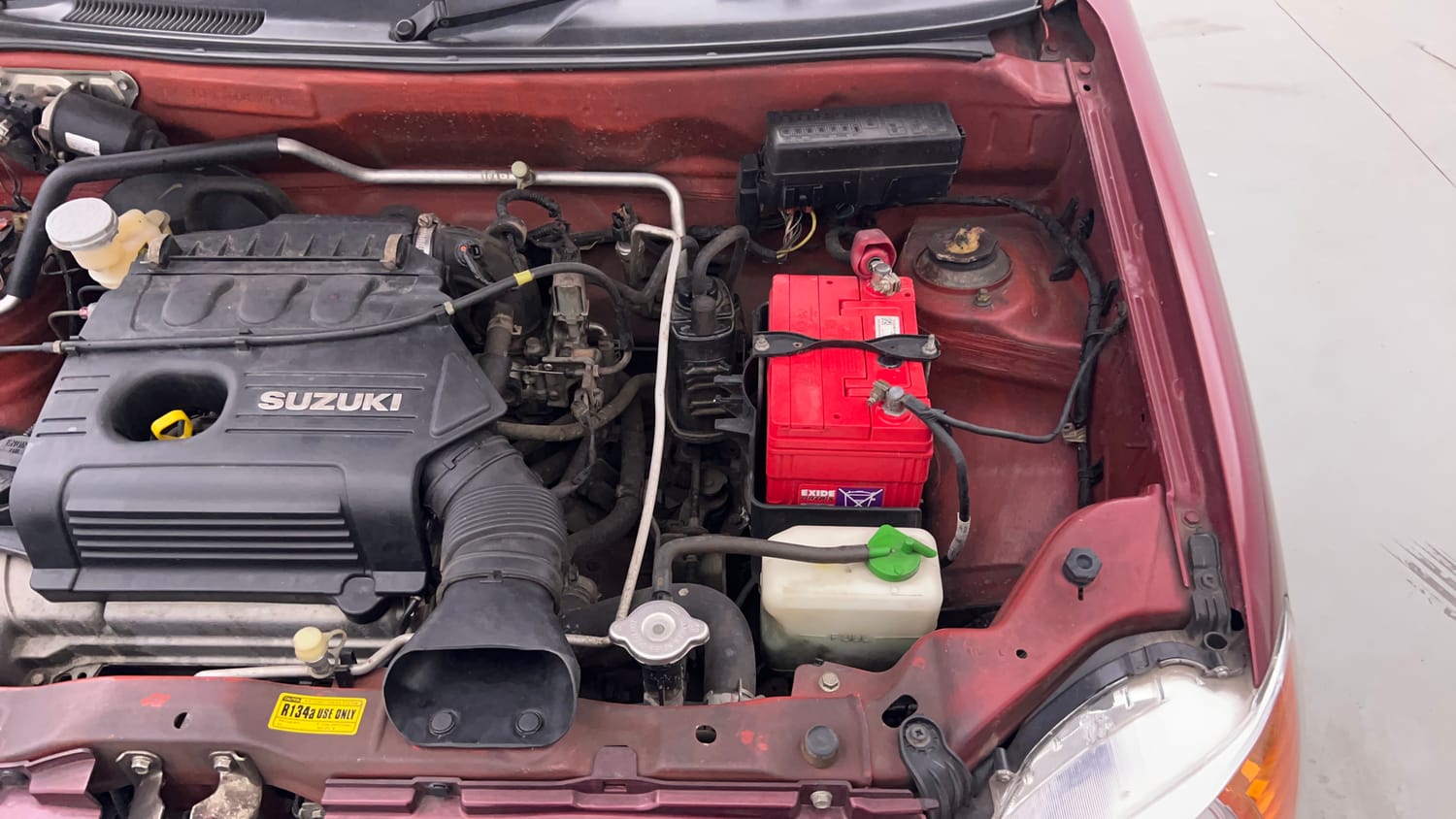 Used 2014 Maruti Suzuki Alto K10 VXi Petrol Manual engine ENGINE LEFT SIDE VIEW