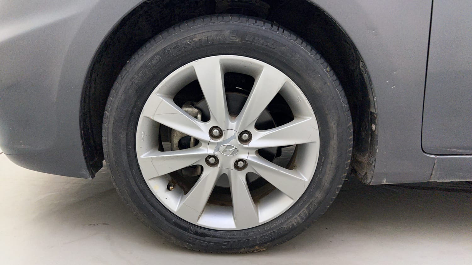 Used 2013 Hyundai Verna Fluidic 1.6 VTVT SX Petrol Manual tyres LEFT FRONT TYRE RIM VIEW