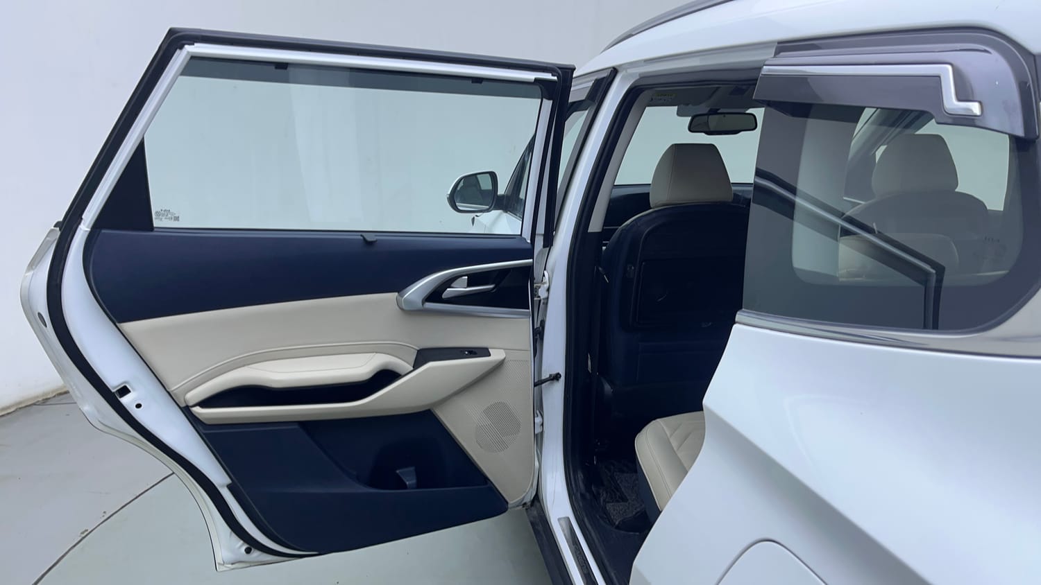 Used 2022 Kia Carens Luxury 1.4 Petrol 7 STR Petrol Manual interior LEFT REAR DOOR OPEN VIEW
