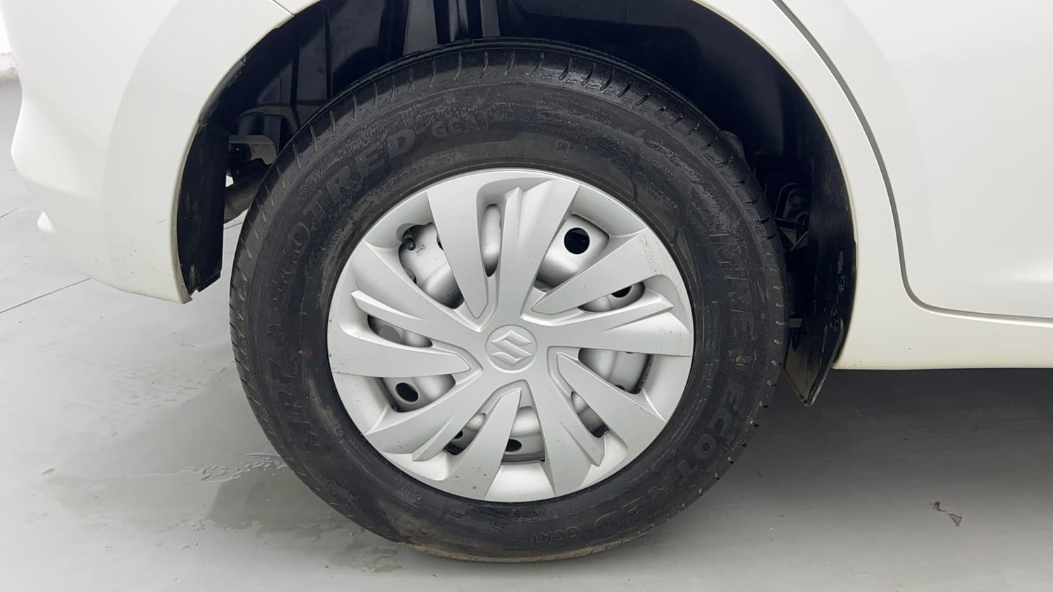 Used 2026 Maruti Suzuki Swift LXi Petrol Manual tyres RIGHT REAR TYRE RIM VIEW
