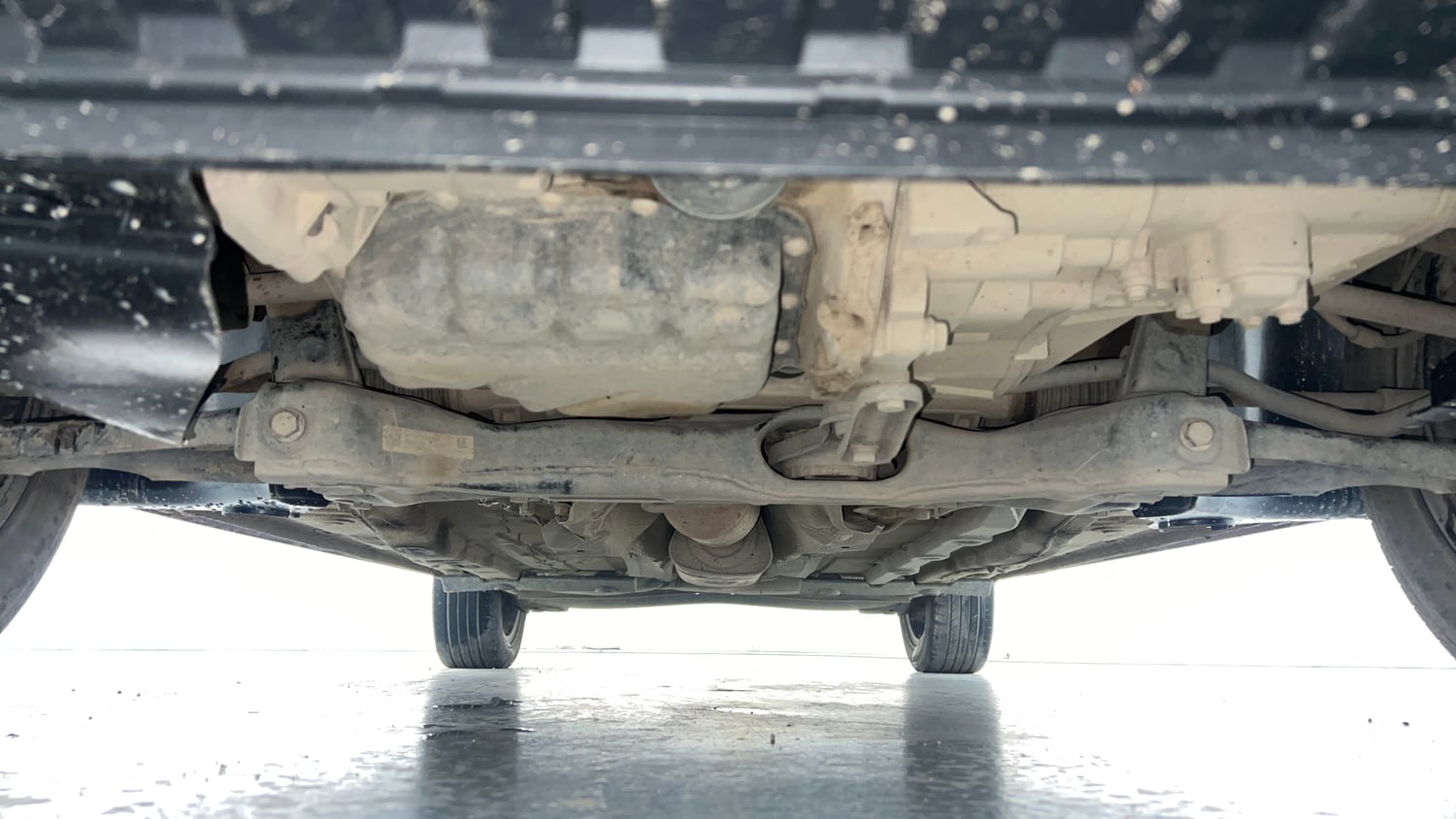 Used 2023 Volkswagen Virtus Topline 1.0 TSI MT Petrol Manual extra FRONT LEFT UNDERBODY VIEW