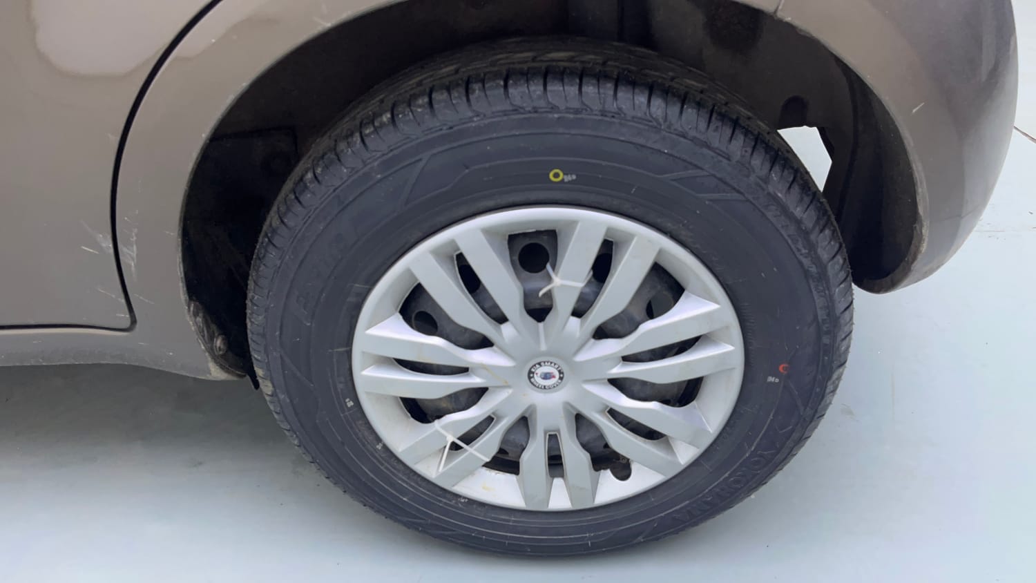 Used 2015 Maruti Suzuki Ritz Vxi BS-IV Petrol Manual tyres LEFT REAR TYRE RIM VIEW