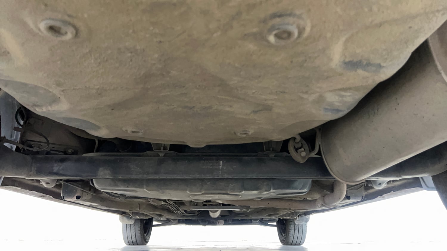 Used 2018 Tata Tigor Revotron XT Petrol + CNG (Outside Fitted) Cng Manual extra REAR UNDERBODY VIEW (TAKEN FROM REAR)