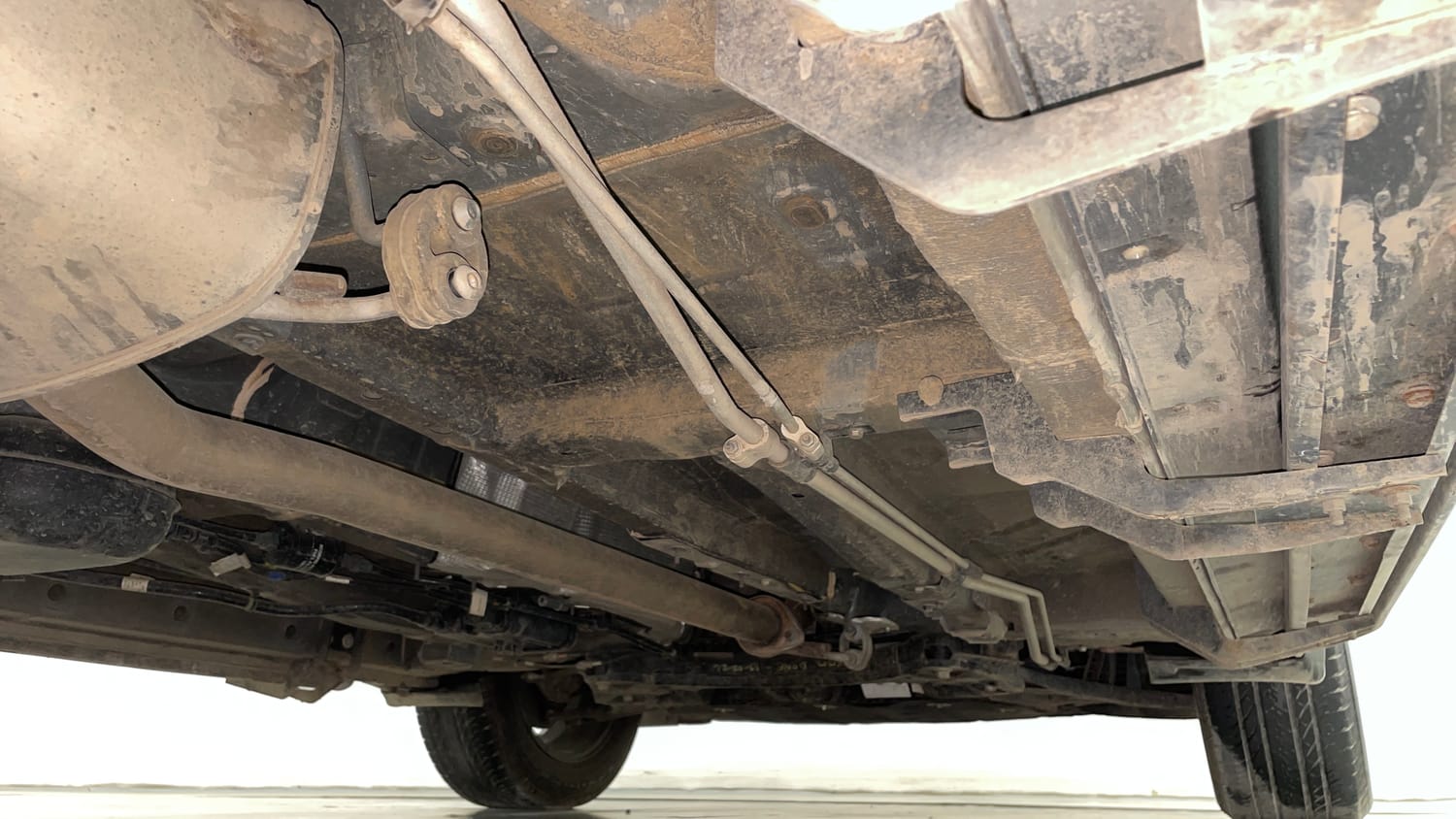 Used 2025 Mahindra XUV700 AX7 Luxury Pack Petrol AT 7 STR Petrol Automatic extra REAR RIGHT UNDERBODY VIEW