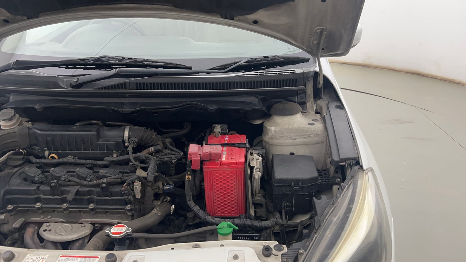Used 2018 Maruti Suzuki Ciaz Alpha Hybrid 1.5 Petrol Manual engine ENGINE LEFT SIDE HINGE & APRON VIEW