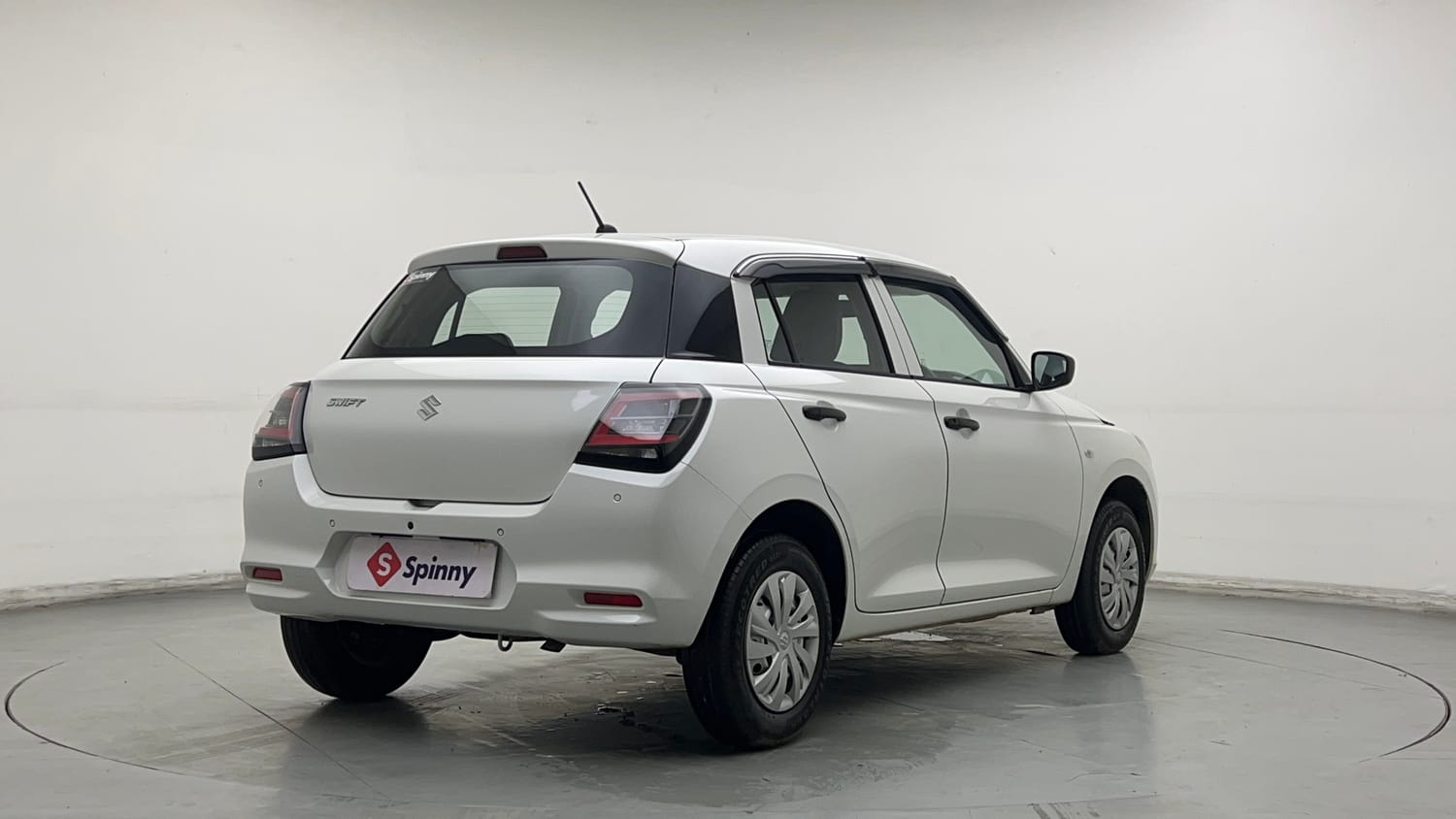 Used 2026 Maruti Suzuki Swift LXi Petrol Manual exterior RIGHT REAR CORNER VIEW