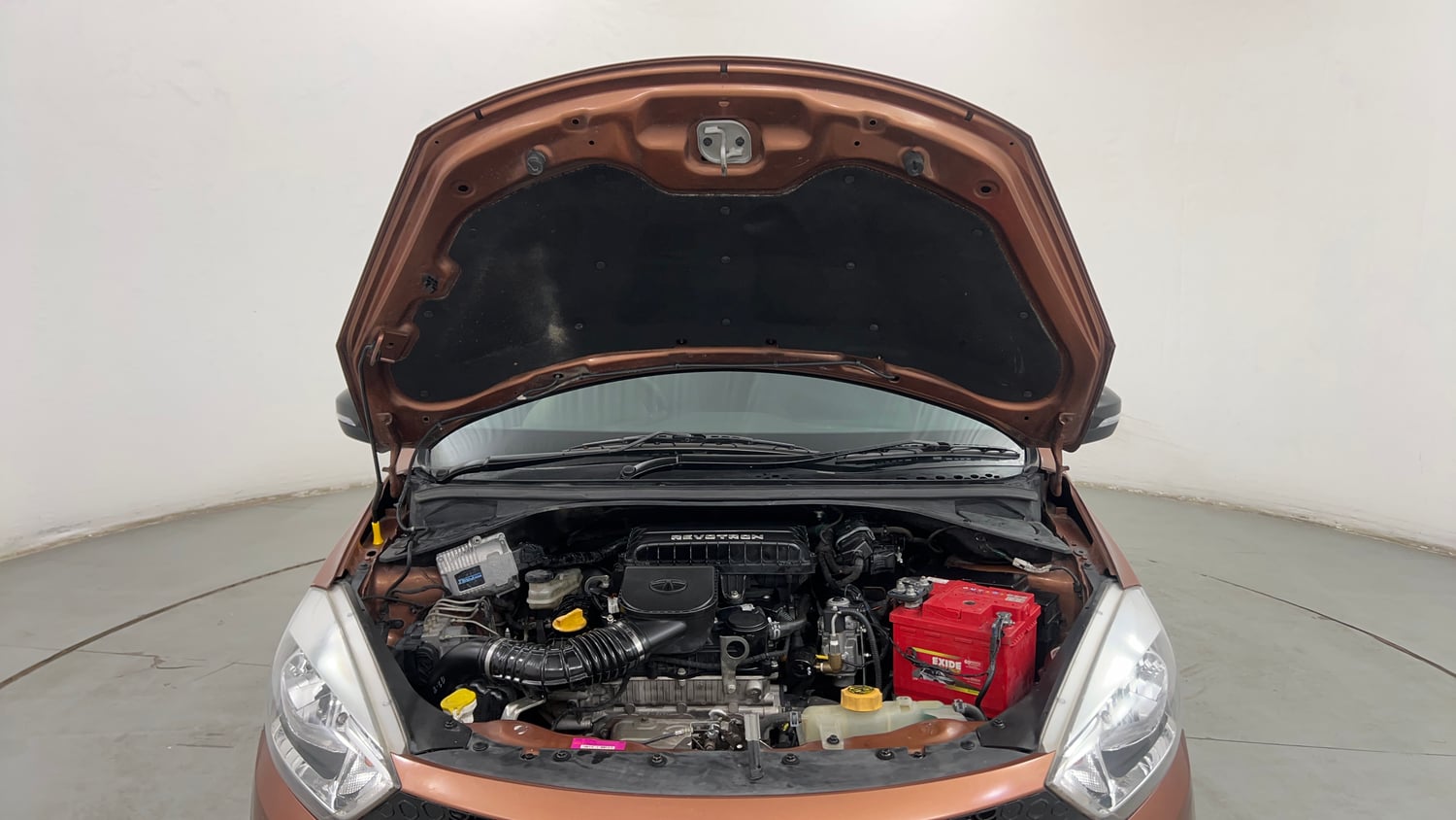 Used 2018 Tata Tigor Revotron XT Petrol + CNG (Outside Fitted) Cng Manual engine ENGINE & BONNET OPEN FRONT VIEW