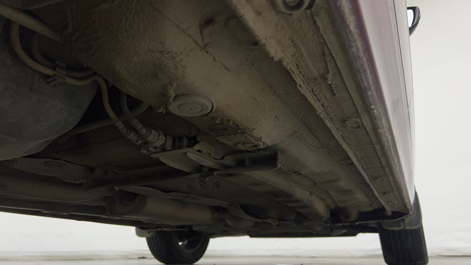 Used 2023 Volkswagen Virtus Topline 1.0 TSI MT Petrol Manual extra REAR RIGHT UNDERBODY VIEW