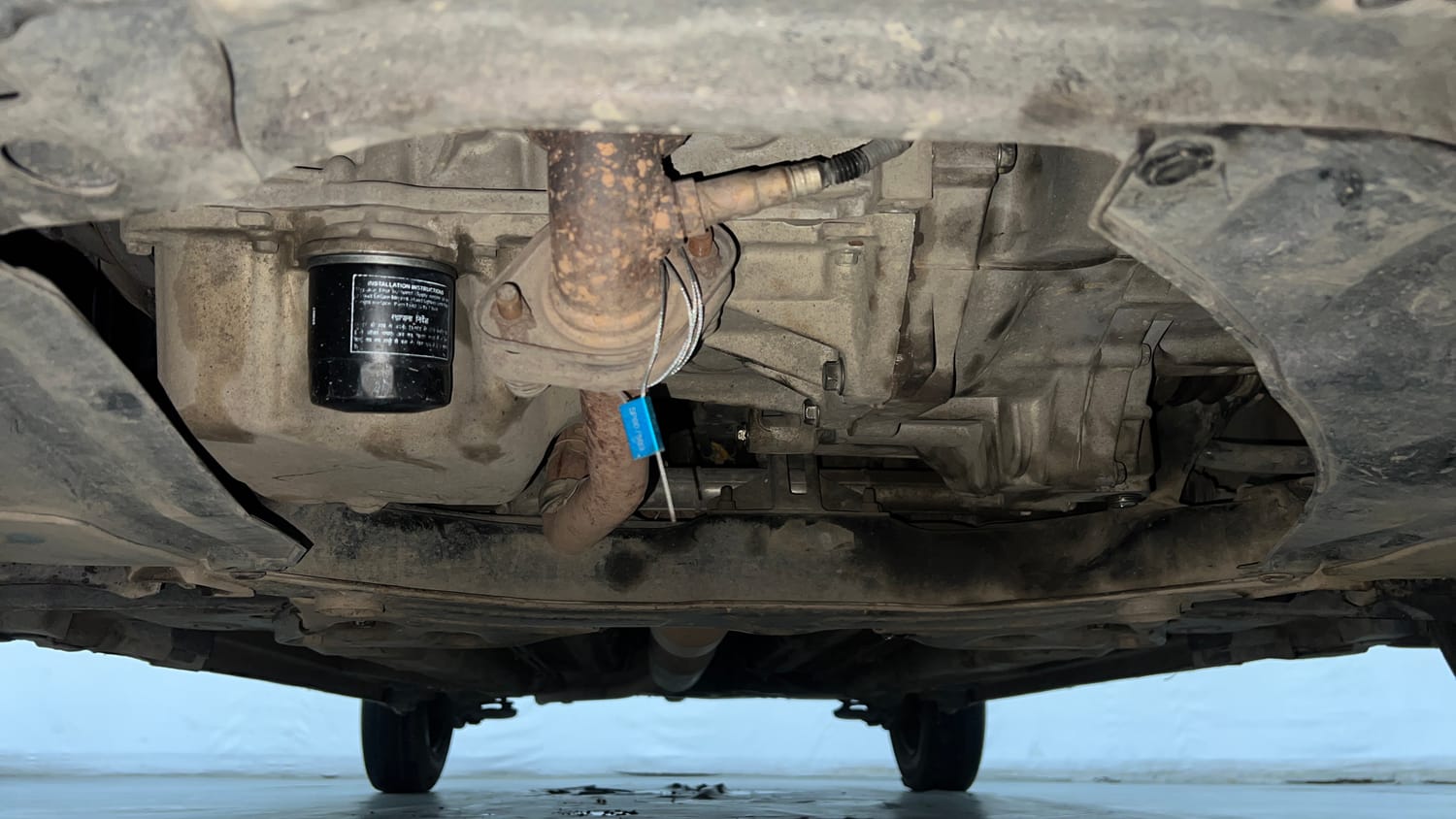 Used 2015 Maruti Suzuki Swift Dzire VXI Petrol Manual extra FRONT LEFT UNDERBODY VIEW