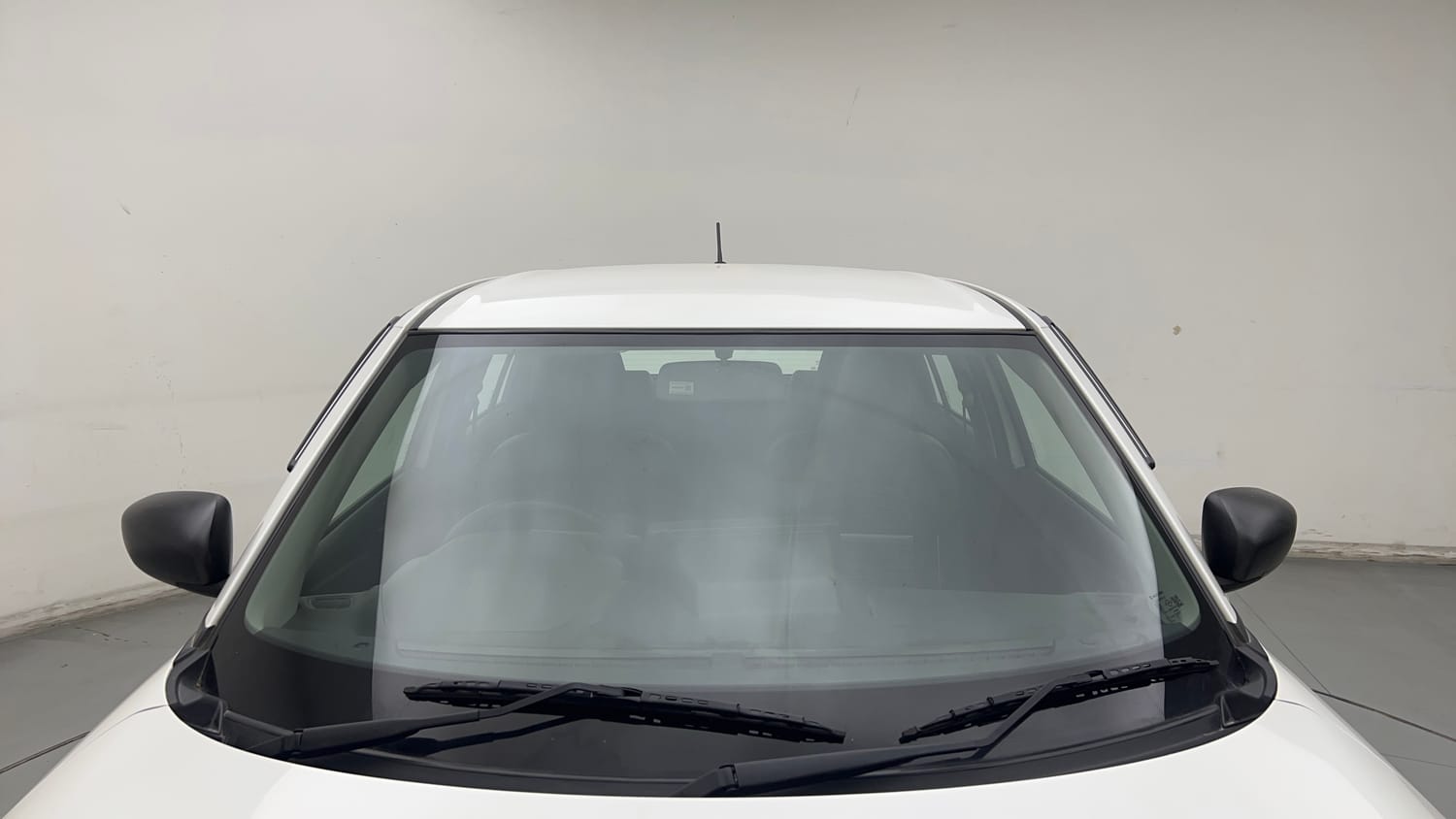 Used 2026 Maruti Suzuki Swift LXi Petrol Manual exterior FRONT WINDSHIELD VIEW