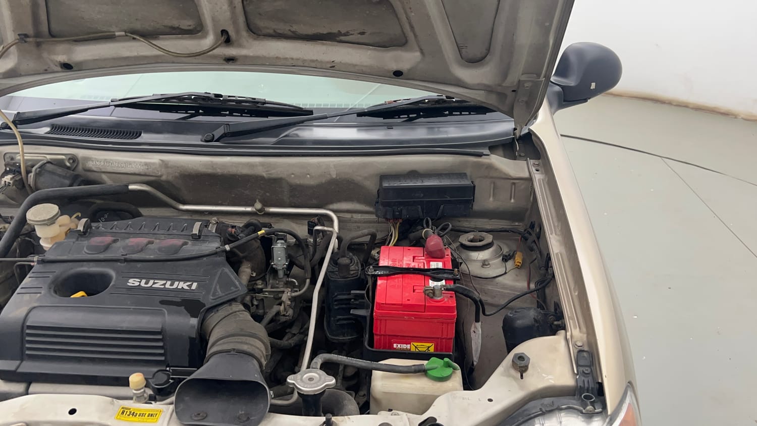 Used 2013 Maruti Suzuki Alto K10 LXi Petrol Manual engine ENGINE LEFT SIDE HINGE & APRON VIEW