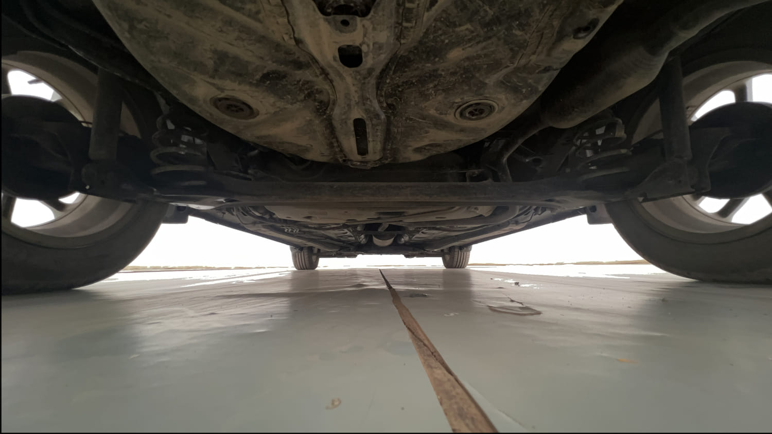 Used 2020 Maruti Suzuki Swift ZXi AMT Petrol Automatic extra REAR UNDERBODY VIEW (TAKEN FROM REAR)