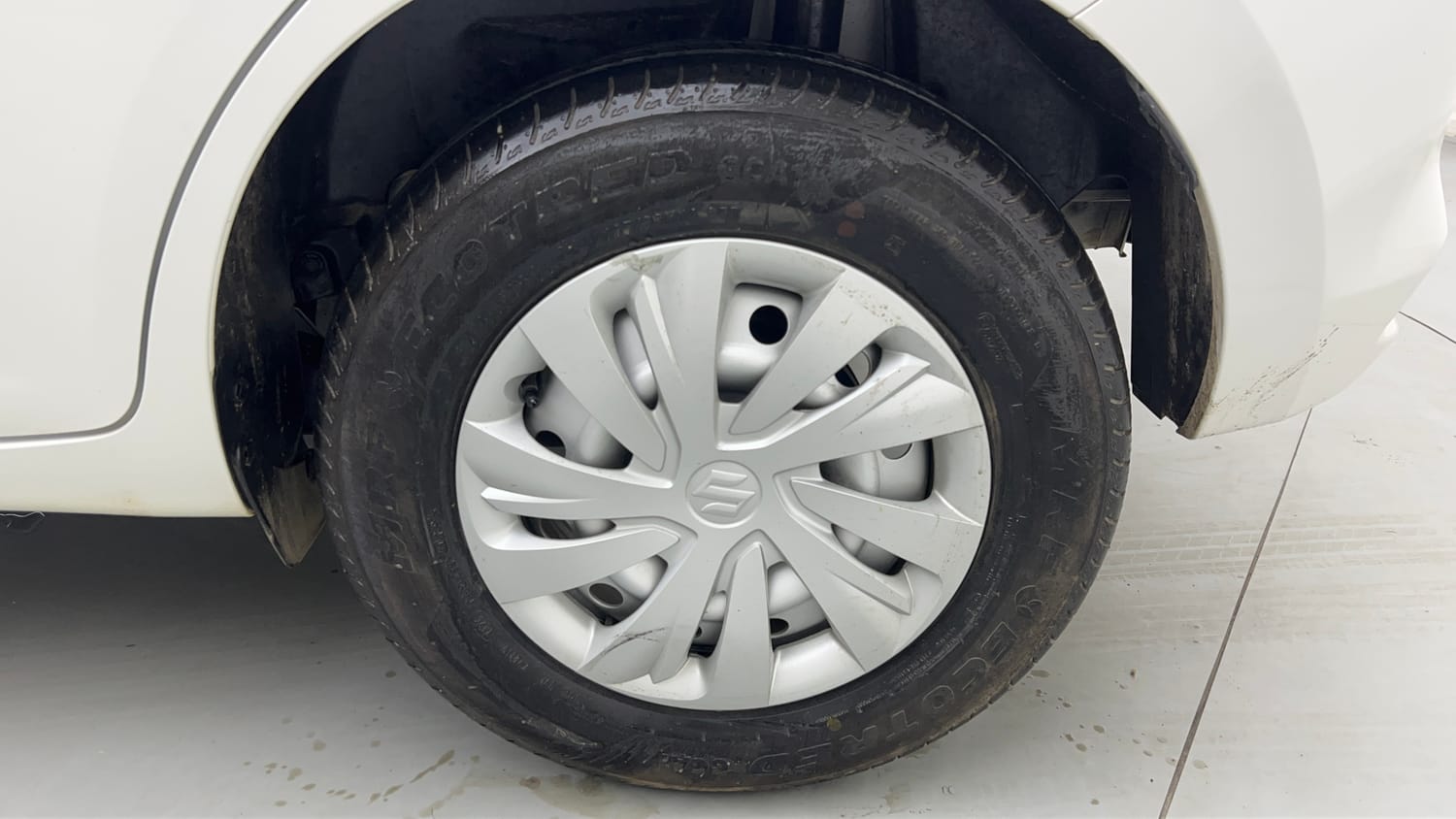 Used 2026 Maruti Suzuki Swift LXi Petrol Manual tyres LEFT REAR TYRE RIM VIEW