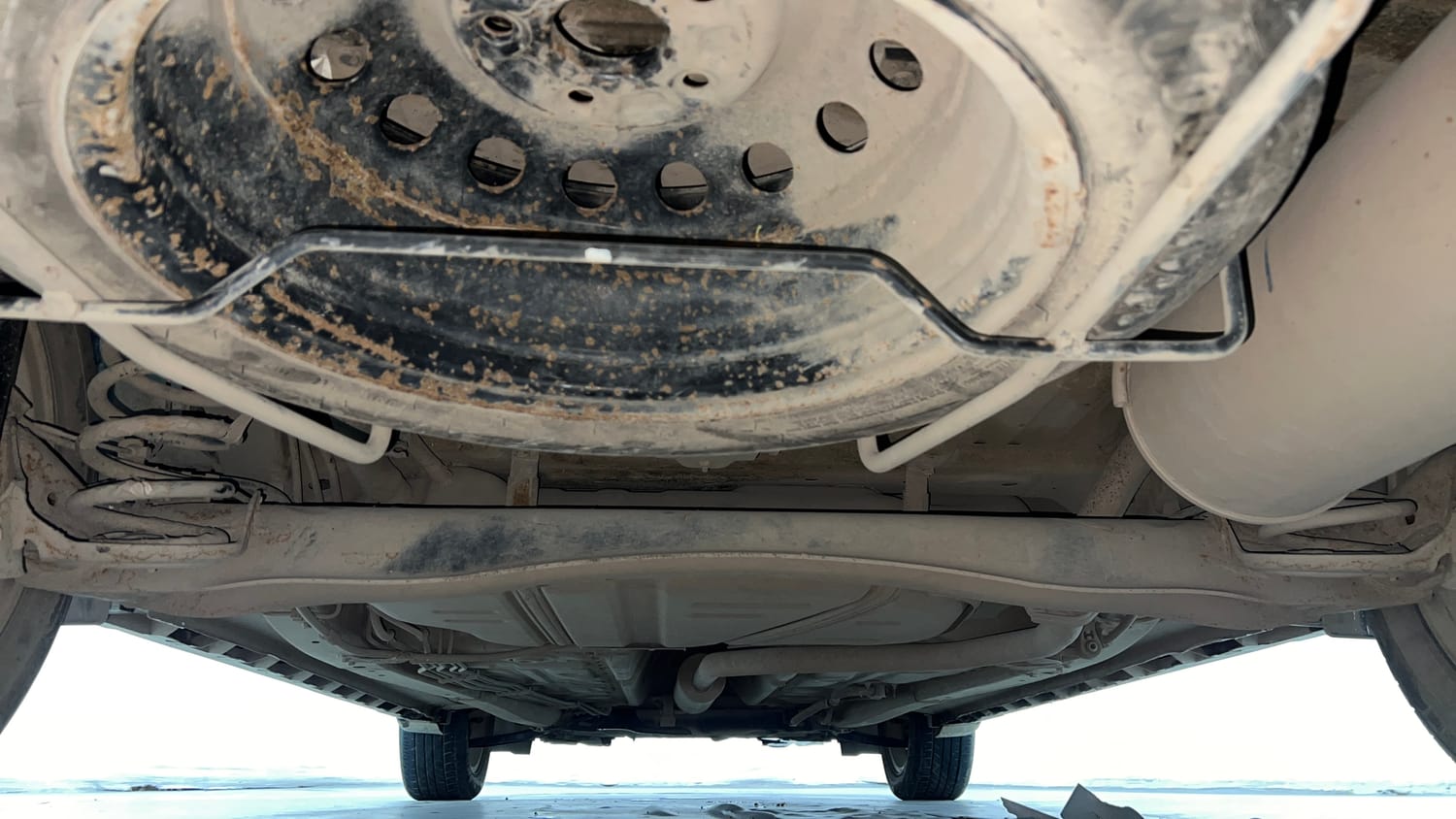 Used 2023 Maruti Suzuki XL6 Zeta MT CNG Cng Manual extra REAR UNDERBODY VIEW (TAKEN FROM REAR)