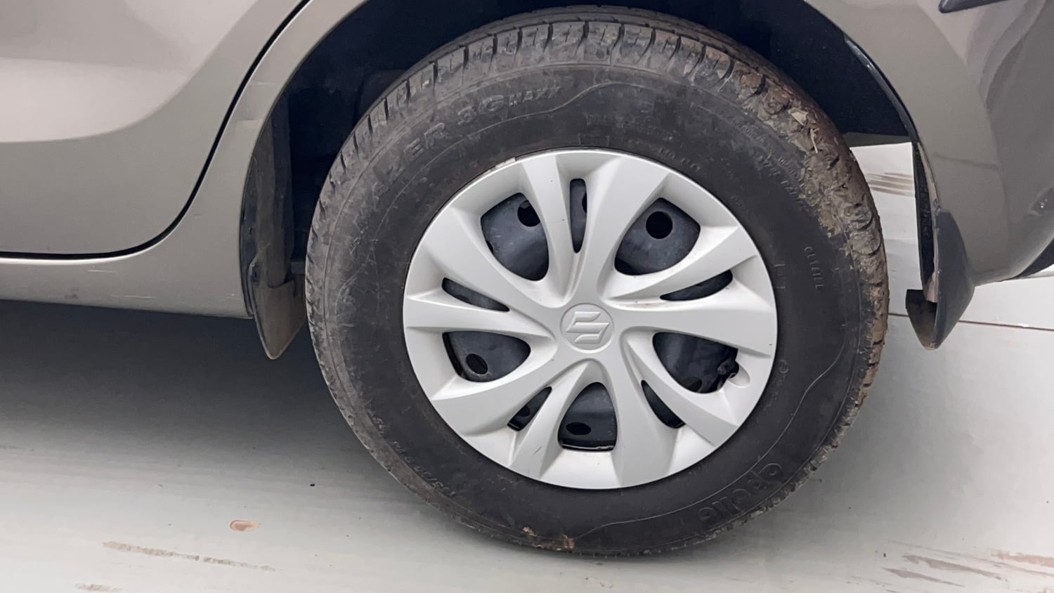 Used 2023 Maruti Suzuki Swift VXi Petrol Manual tyres LEFT REAR TYRE RIM VIEW